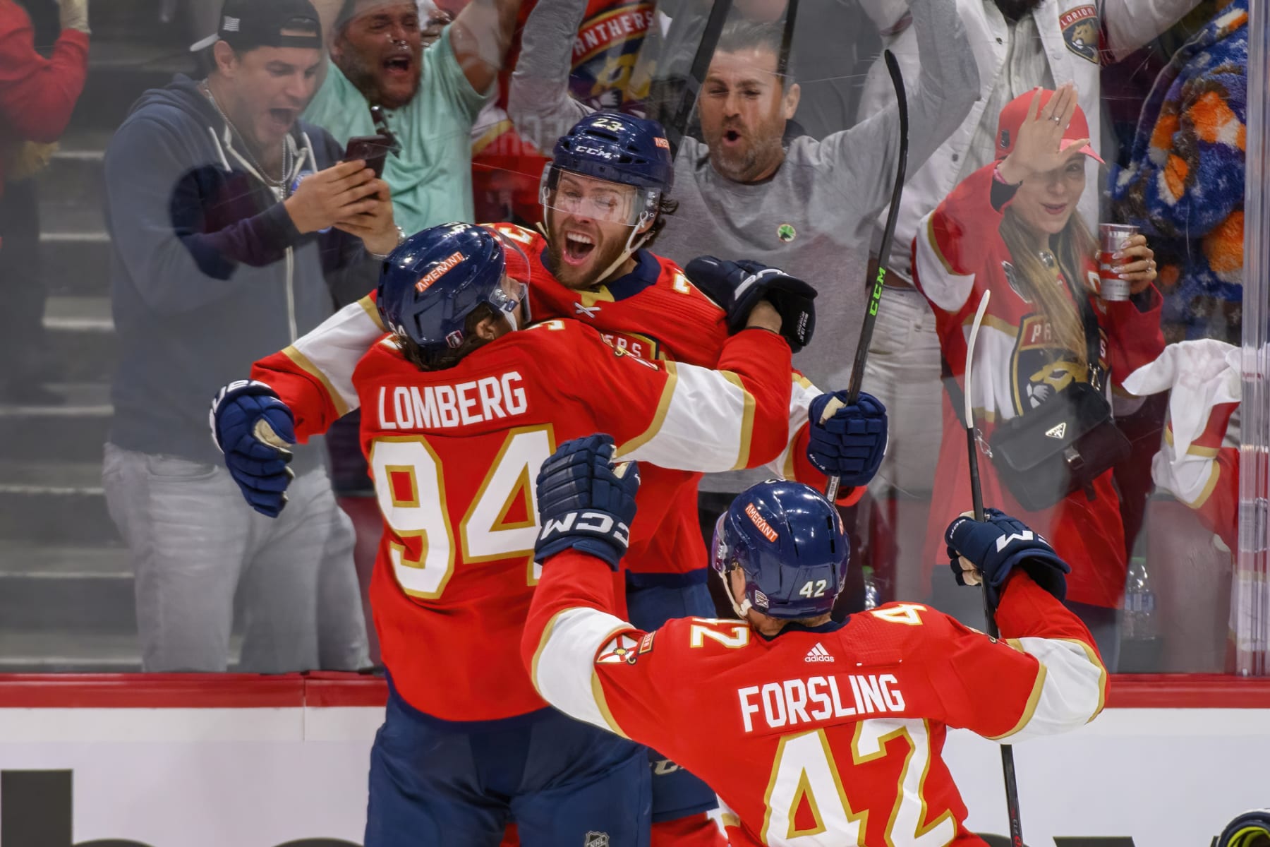 SUNRISE, FL - JUNE 08: Florida Panthers center Carter Verhaeghe (23) celebrates scoring the game winning goal with Florida Panthers left wing Ryan Lomberg (94) during Game Three of the NHL Stanley Cup Final between the Vegas Golden Knights and the Florida Panthers on June 8, 2023 at the FLA Live Arena in Sunrise, Florida. The Panthers defeated the Golden Knights 3-2 in overtime. (Photo by Doug Murray/Icon Sportswire via Getty Images)