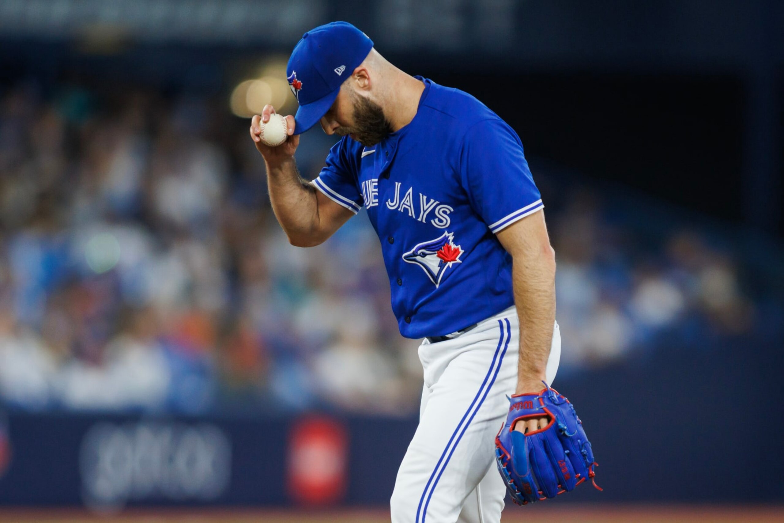 TORONTO, CANADA - MAY 31: Anthony Bass #52 of the Toronto Blue Jays pitches in the ninth inning of their MLB game against the Milwaukee Brewers at Rogers Centre on May 31, 2023 in Toronto, Canada. (Photo by Cole Burston/Getty Images)