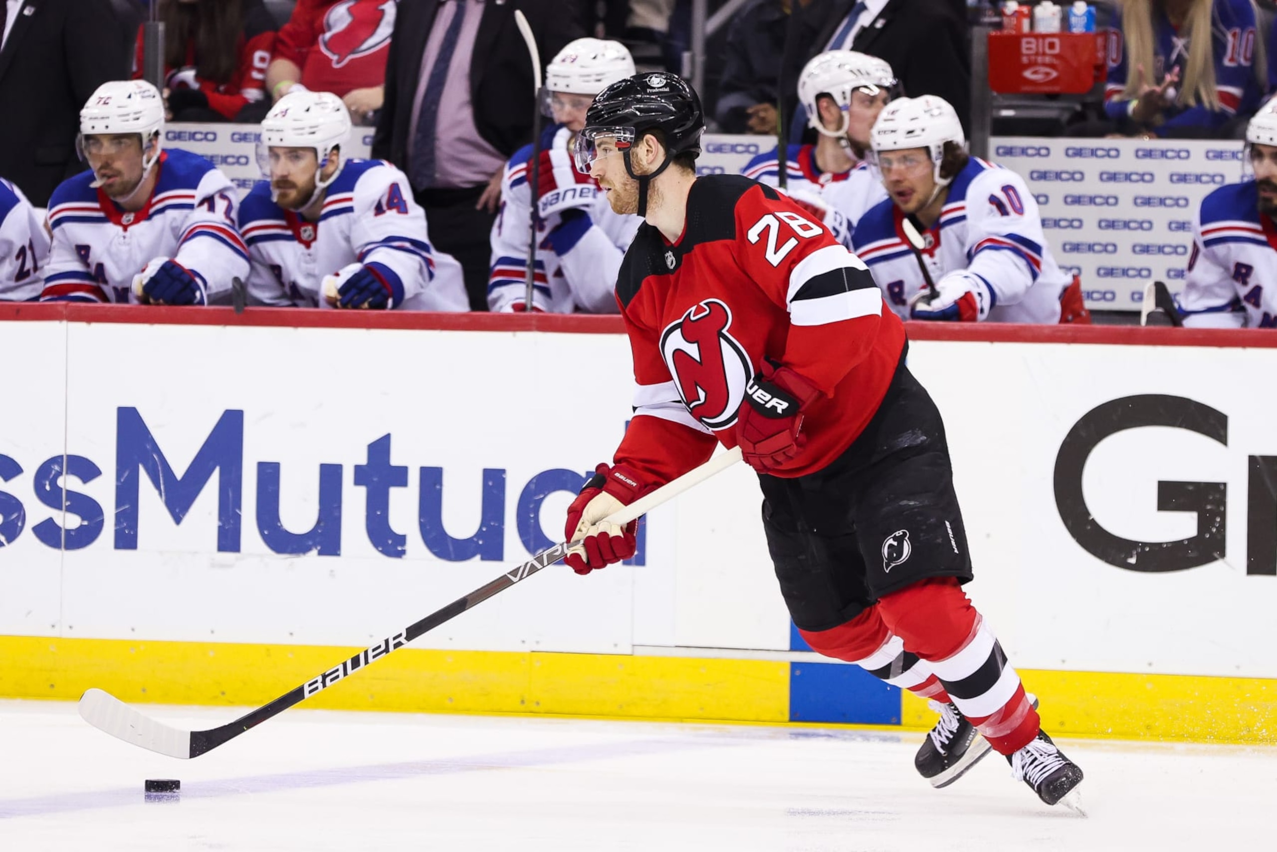 NEWARK, NJ - APRIL 27: New Jersey Devils defenseman Damon Severson (28) skates with the puck during the National Hockey League game between the New York Rangers and the New Jersey Devils on April 27, 2023 at Prudential Center in Newark, NJ. (Photo by Andrew Mordzynski/Icon Sportswire via Getty Images)