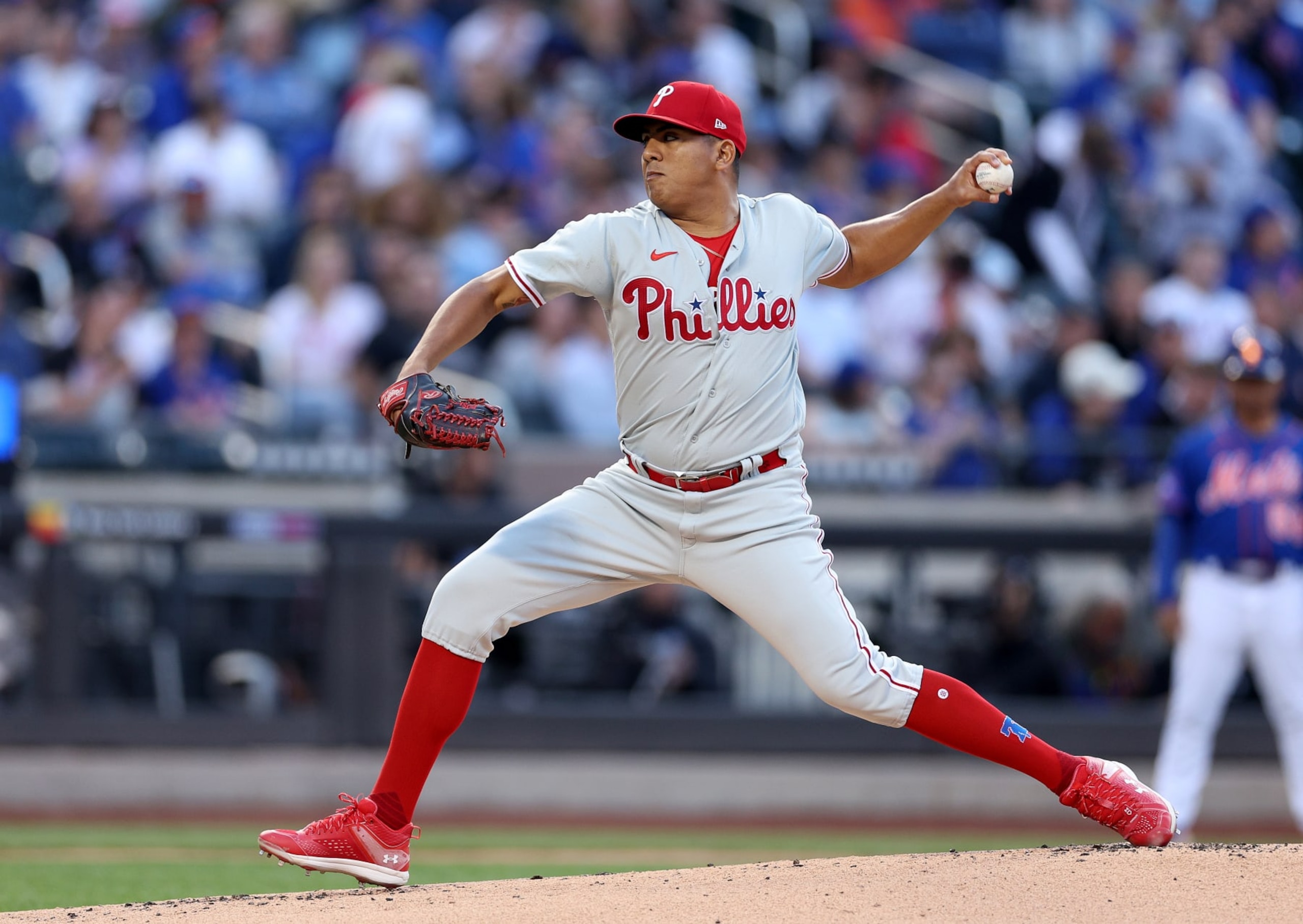 NEW YORK, NEW YORK - MAY 30:  Ranger Suarez #55 of the Philadelphia Phillies delivers a pitch in the first inning against the New York Mets at Citi Field on May 30, 2023 in the Flushing neighborhood of the Queens borough of New York City. (Photo by Elsa/Getty Images)