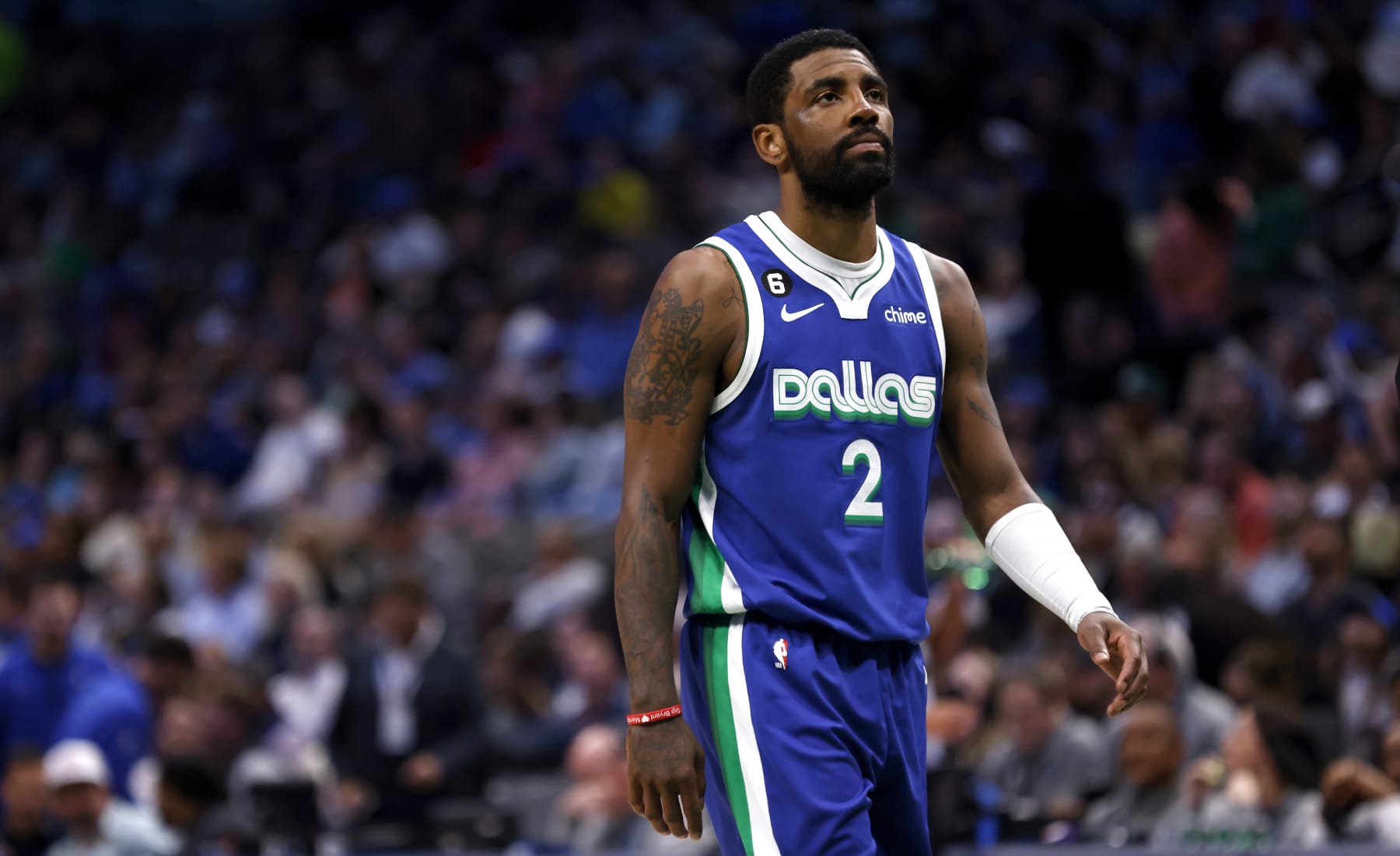 DALLAS, TX - APRIL 5: Kyrie Irving #2 of the Dallas Mavericks looks on during action against the Sacramento Kings in the first half at American Airlines Center on April 5, 2023 in Dallas, Texas. NOTE TO USER: User expressly acknowledges and agrees that, by downloading and or using this photograph, User is consenting to the terms and conditions of the Getty Images License Agreement. (Photo by Ron Jenkins/Getty Images)
