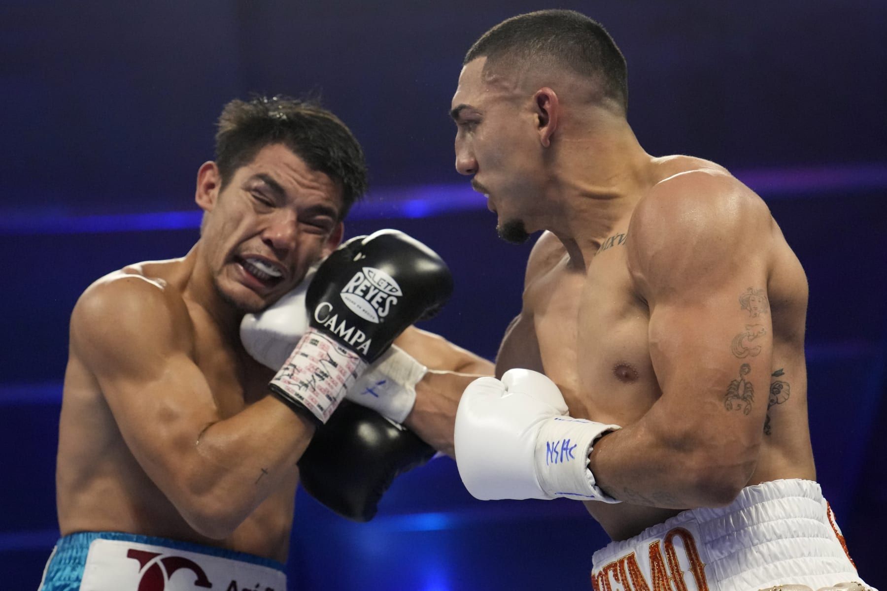 Teofimo Lopez lands a right to Pedro Campa in a junior welterweight boxing match, Saturday, Aug. 13, 2022, in Las Vegas. (AP Photo/John Locher)