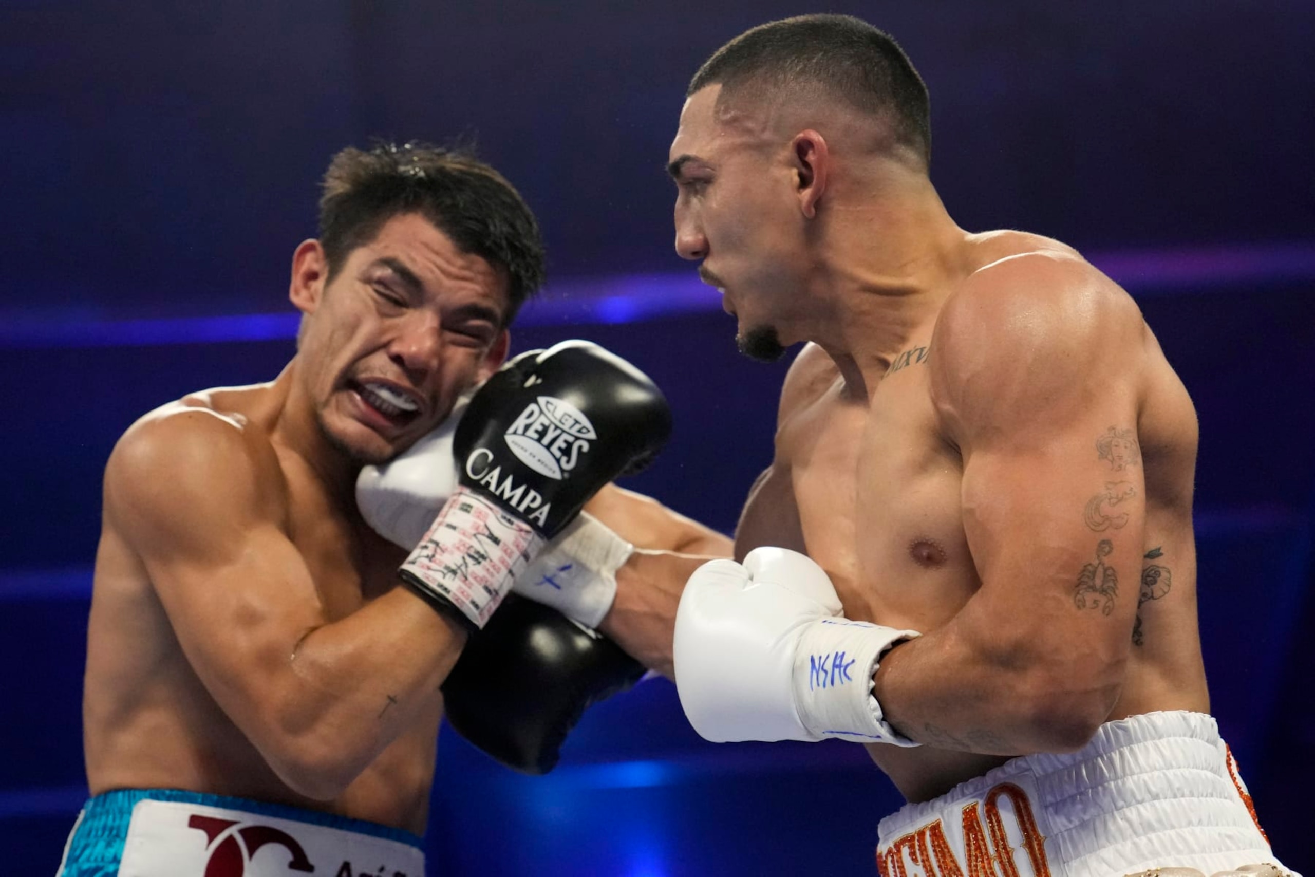 Teofimo Lopez lands a right to Pedro Campa in a junior welterweight boxing match, Saturday, Aug. 13, 2022, in Las Vegas. (AP Photo/John Locher)