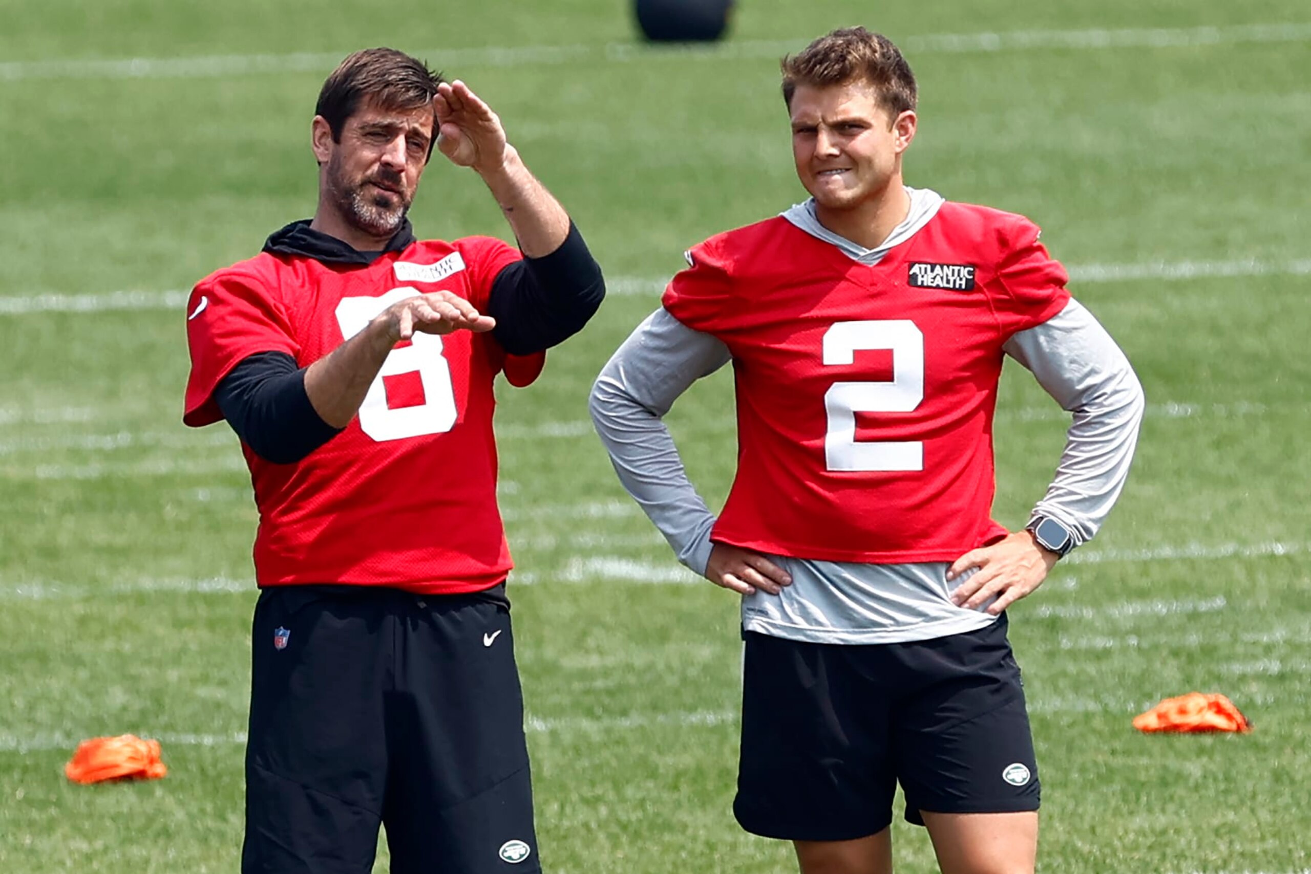 FLORHAM PARK, NEW JERSEY - JUNE 6: Quarterbacks Aaron Rodgers #8 and Zach Wilson #2 of the New York Jets talk during the team's OTA's at Atlantic Health Jets Training Center on June 6, 2023 in Florham Park, New Jersey. (Photo by Rich Schultz/Getty Images)