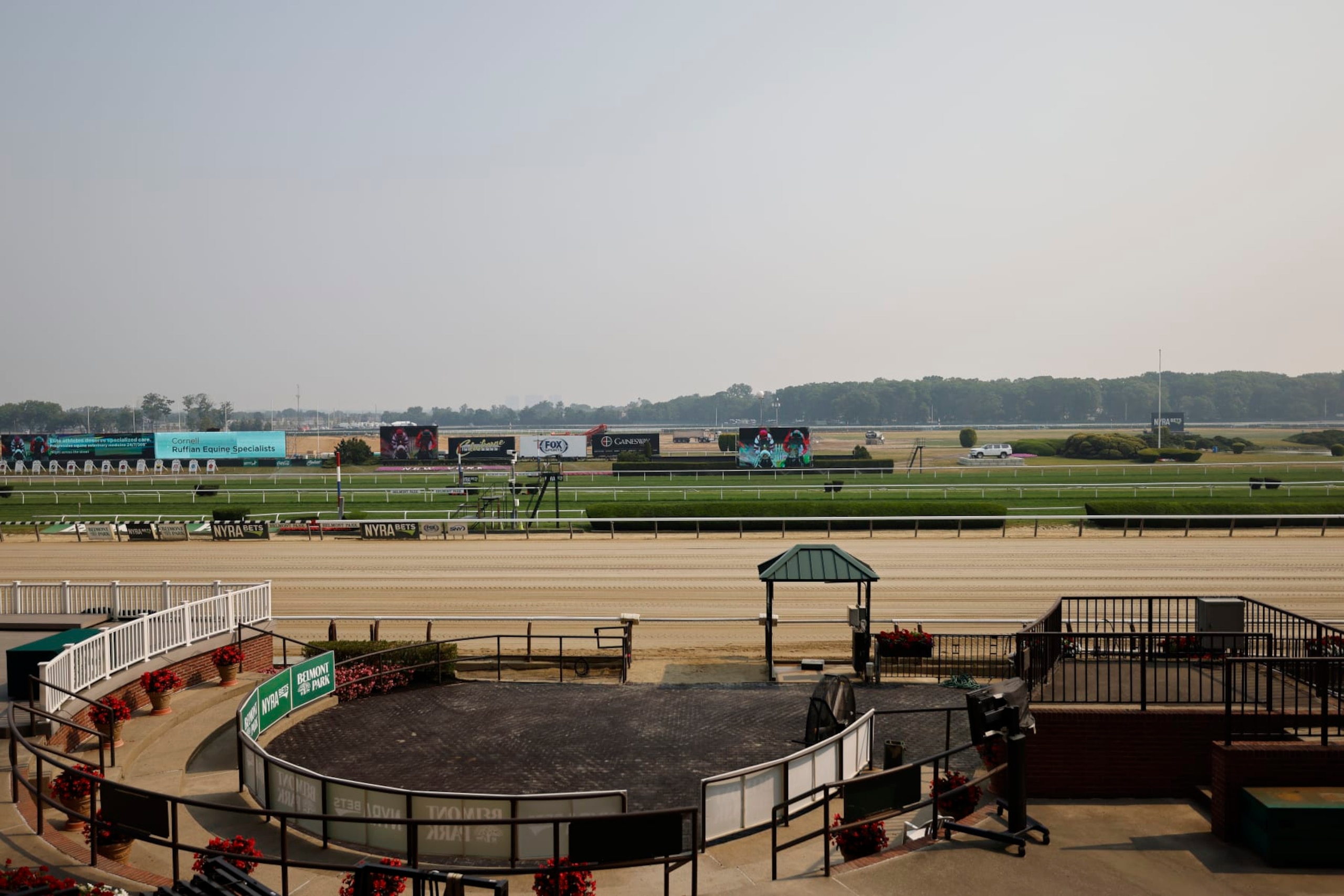 ELMONT, NEW YORK - JUNE 08:  The main track is seen prior to the 155th running of the Belmont Stakes at Belmont Park on June 08, 2023 in Elmont, New York.  All training and racing on the track were cancelled today due to the Canadian wildfires.  Air pollution alerts were issued across the United States due to smoke from wildfires that have been burning in Canada for weeks.  (Photo by Al Bello/Getty Images)