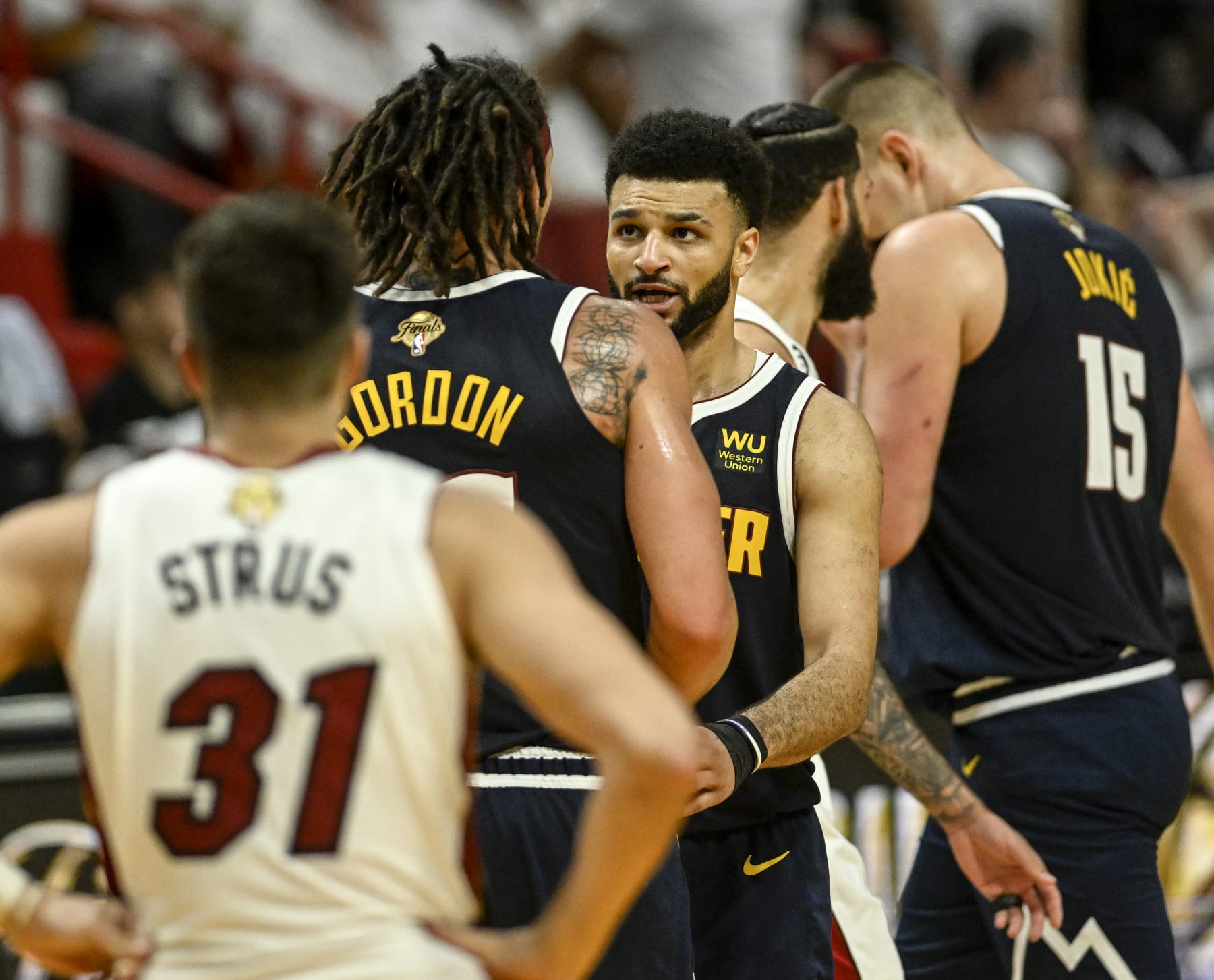 MIAMI, FL - JUNE 9: Jamal Murray (27) of the Denver Nuggets speaks to Aaron Gordon (50) in the first half of the Nuggets' 108-95 win over the Miami Heat during Game 4 of the NBA Finals at the Kaseya Center in Miami on Friday, June 9, 2023. (Photo by AAron Ontiveroz/The Denver Post)