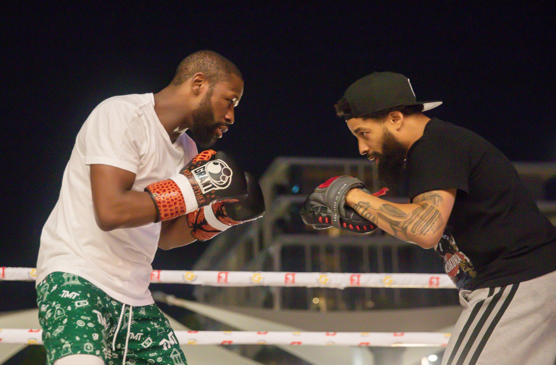 DUBAI, UAE - NOVEMBER 08: Floyd Mayweather and Deji Olatunji attend a training prior to their boxing match at Coca-Cola Arena in Dubai, UAE on November 08, 2022. (Photo by Waleed Zein/Anadolu Agency via Getty Images)