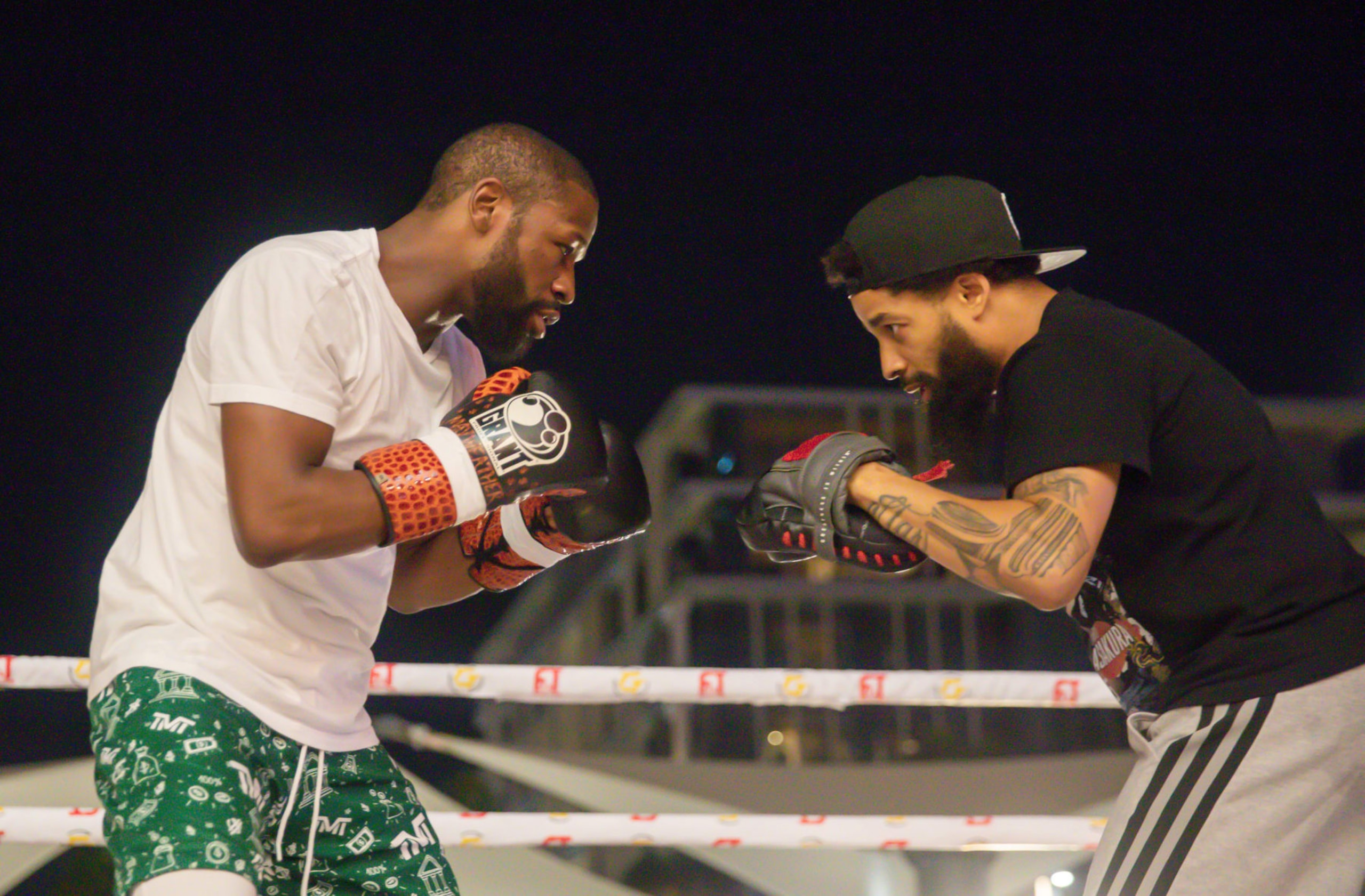 DUBAI, UAE - NOVEMBER 08: Floyd Mayweather and Deji Olatunji attend a training prior to their boxing match at Coca-Cola Arena in Dubai, UAE on November 08, 2022. (Photo by Waleed Zein/Anadolu Agency via Getty Images)