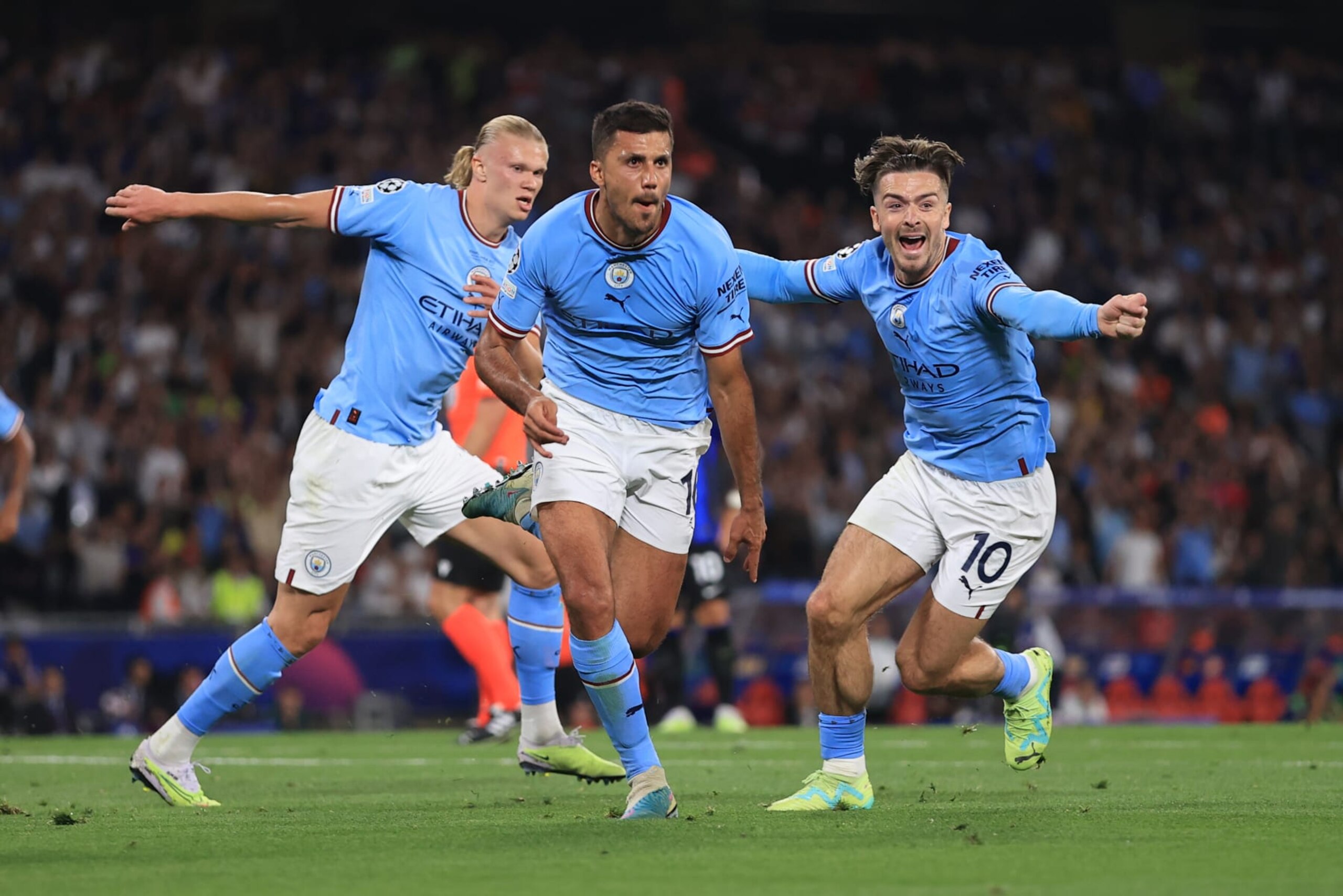 ISTANBUL, TURKEY - JUNE 10: Jack Grealish (far right) of Manchester City celebrates the opening goal scored by Rodri of Manchester City during the UEFA Champions League 2022/23 final match between FC Internazionale and Manchester City FC at Atatuerk Olympic Stadium on June 10, 2023 in Istanbul, Turkey. (Photo by Simon Stacpoole/Offside/Offside via Getty Images)