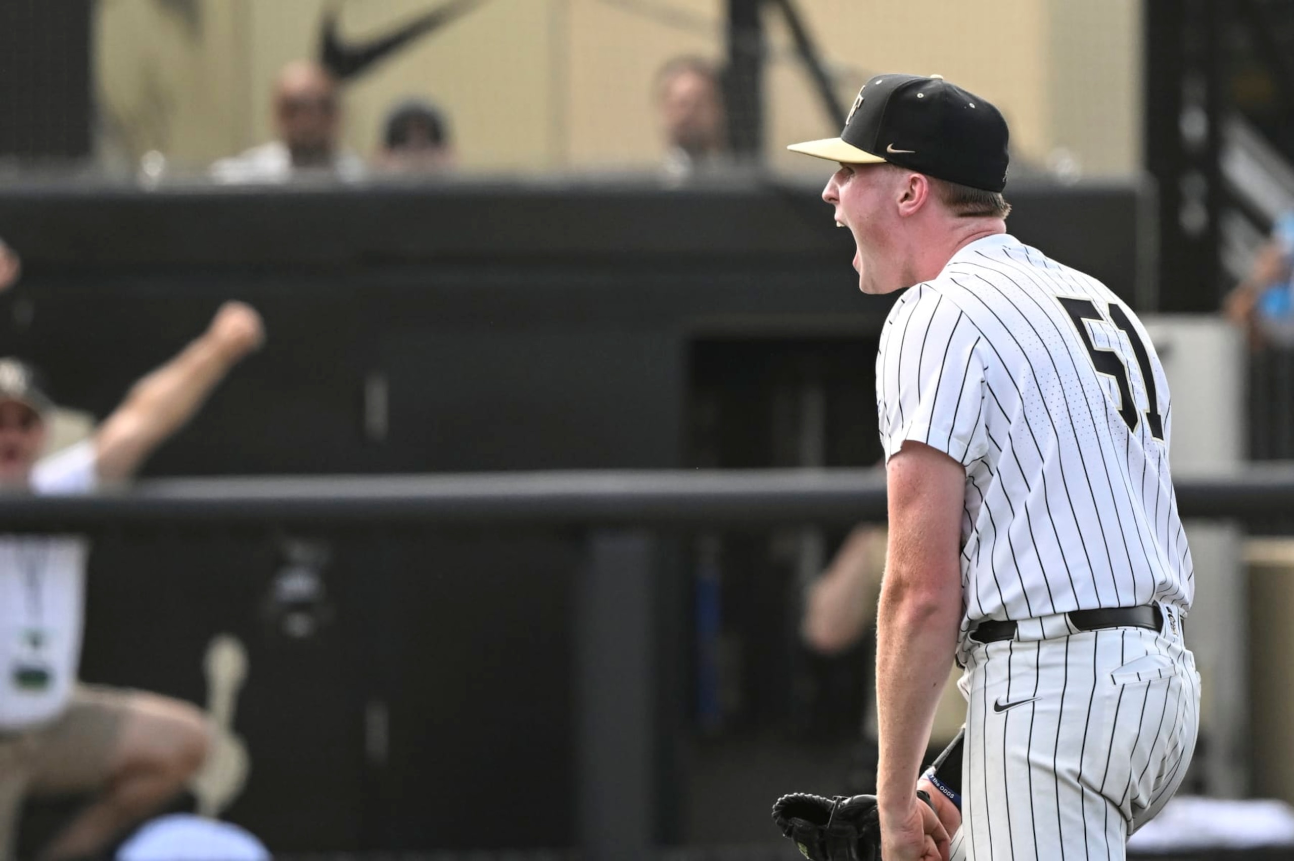 Wake Forest pitcher Sean Sullivan reacts after winning an NCAA college baseball tournament super regional game against Alabama, Saturday, June 10, 2023, in Winston-Salem, N.C. (AP Photo/Matt Kelley)
