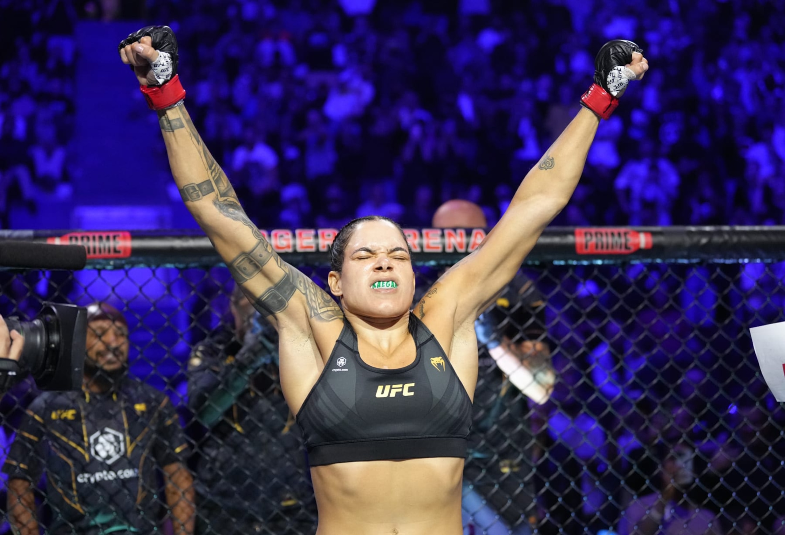 VANCOUVER, BRITISH COLUMBIA - JUNE 10:  Amanda Nunes of Brazil enters the Octagon before facing Irene Aldana of Mexico in their women's bantamweight title fight during the UFC 289 event at Rogers Arena on June 10, 2023 in Vancouver, Canada. (Photo by Jeff Bottari/Zuffa LLC)
