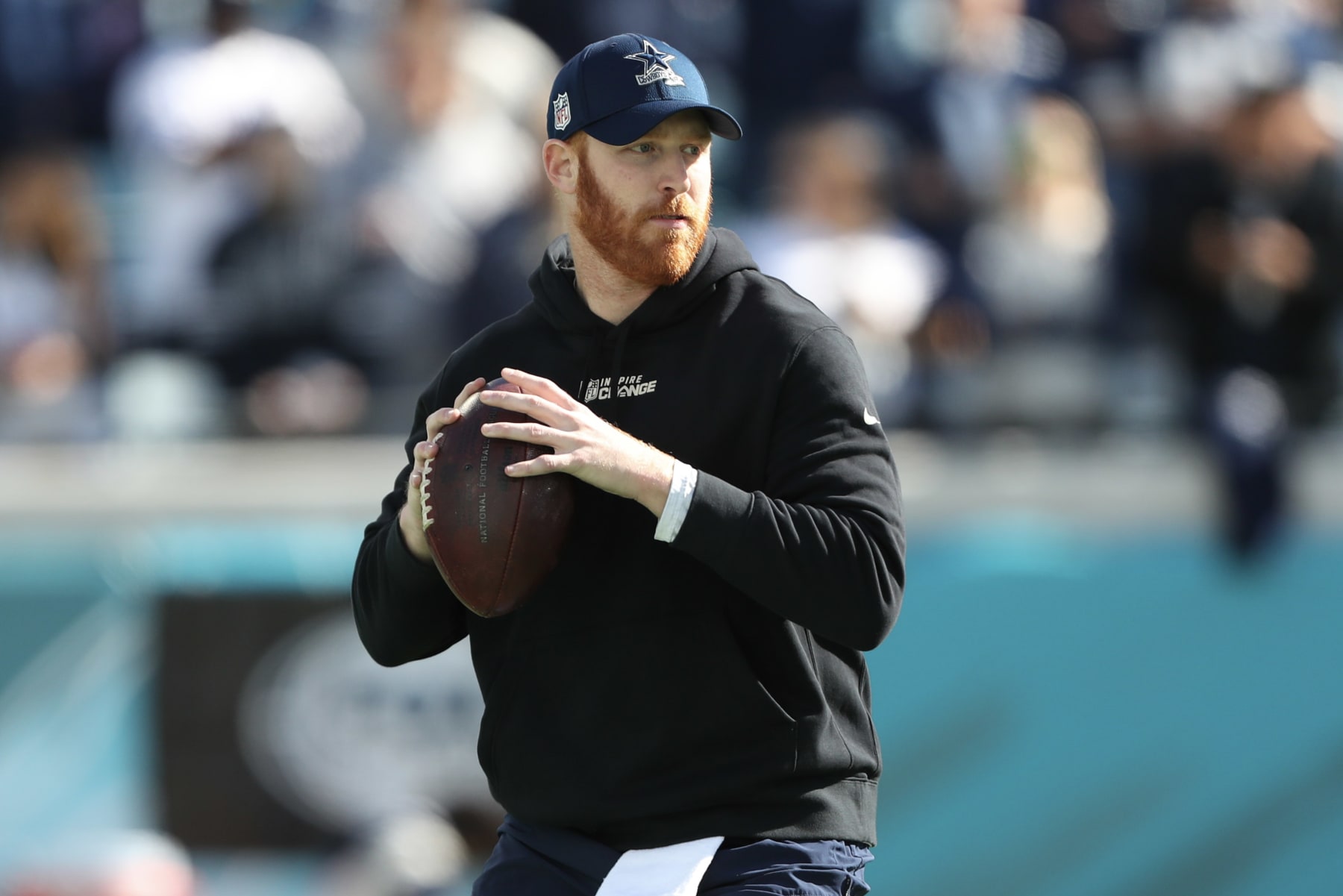 JACKSONVILLE, FLORIDA - DECEMBER 18: Cooper Rush #10 of the Dallas Cowboys warms up before the game against the Jacksonville Jaguars at TIAA Bank Field on December 18, 2022 in Jacksonville, Florida. (Photo by Courtney Culbreath/Getty Images)