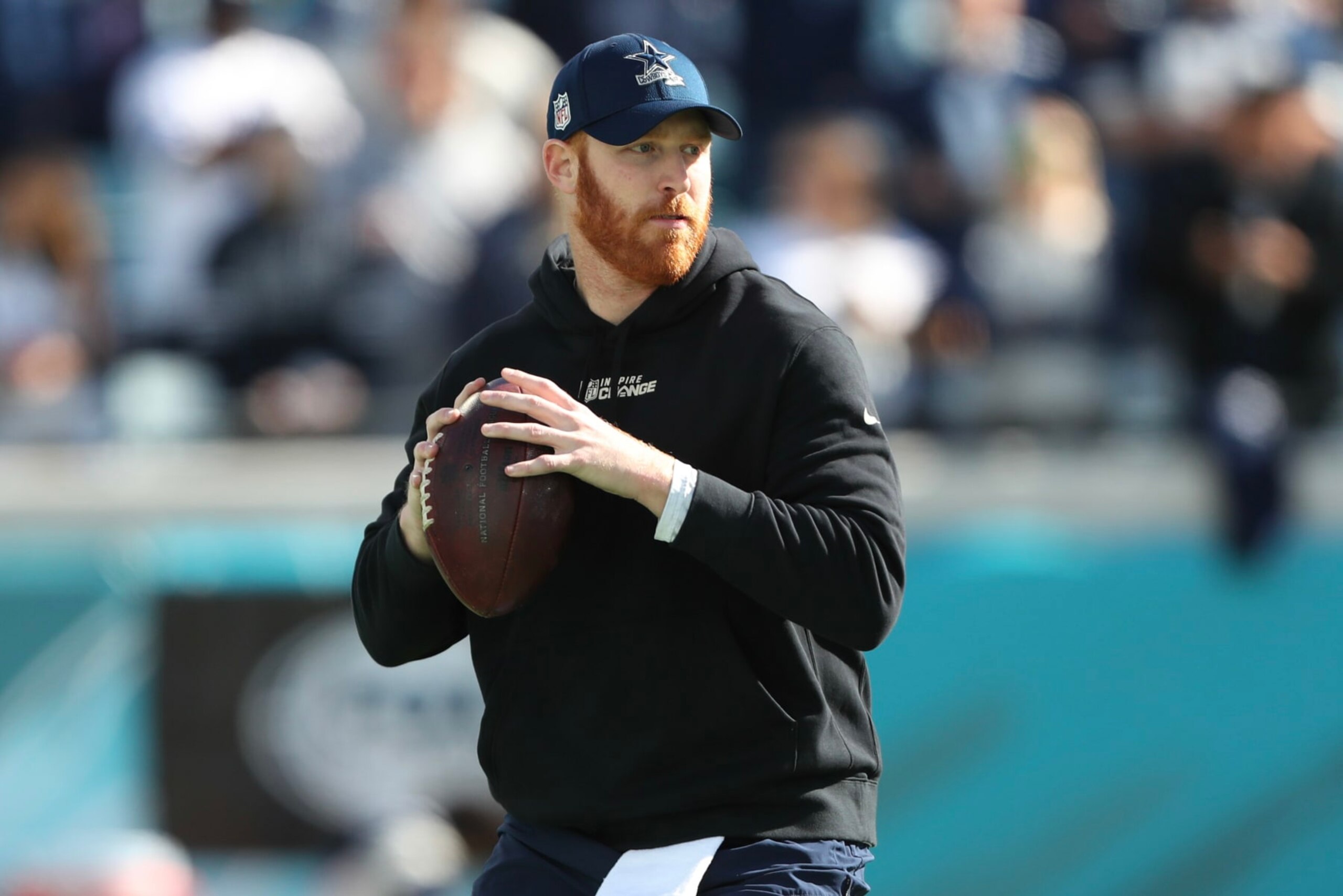 JACKSONVILLE, FLORIDA - DECEMBER 18: Cooper Rush #10 of the Dallas Cowboys warms up before the game against the Jacksonville Jaguars at TIAA Bank Field on December 18, 2022 in Jacksonville, Florida. (Photo by Courtney Culbreath/Getty Images)