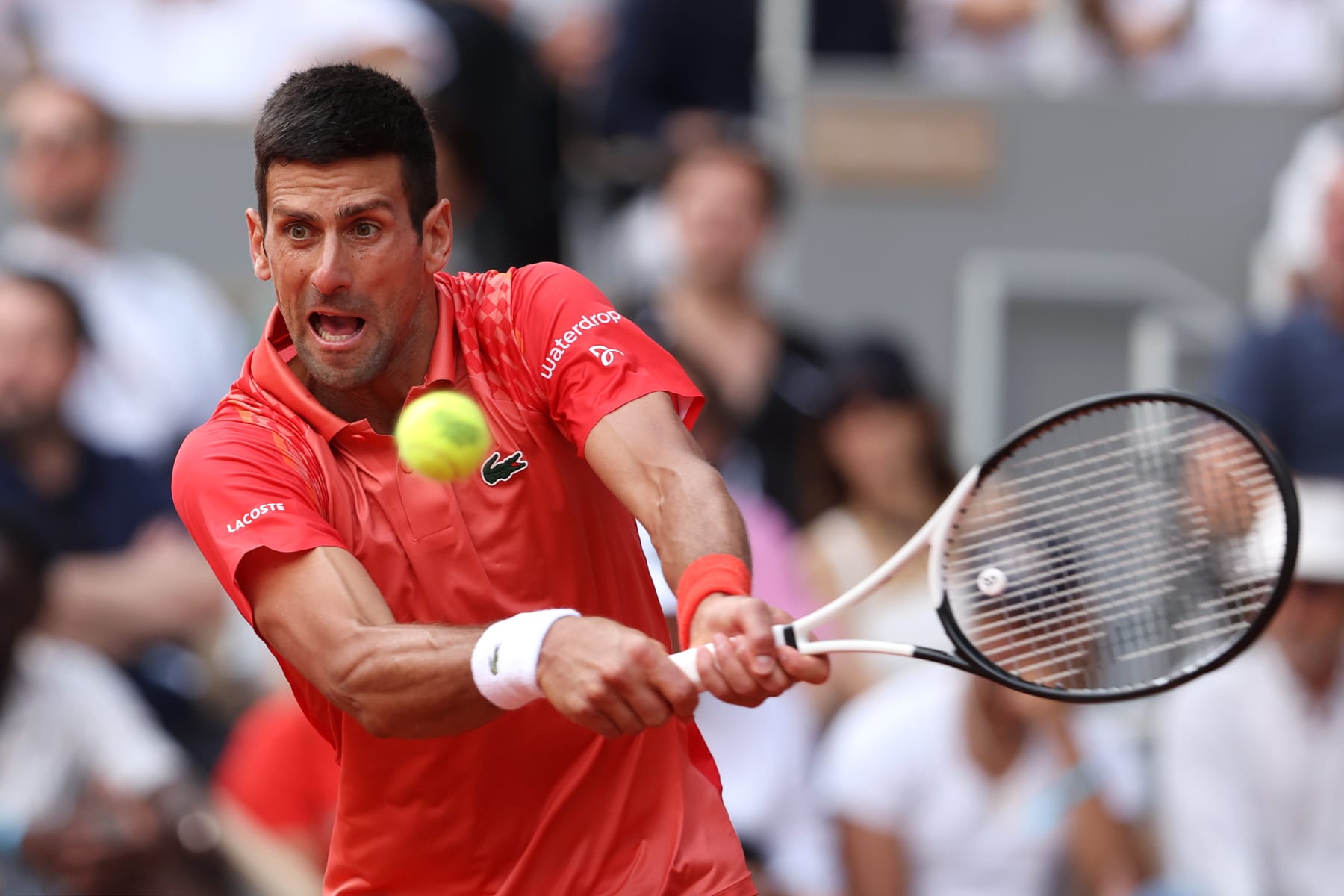 PARIS, FRANCE - JUNE 11: Novak Djokovic of Serbia plays a backhand against Casper Ruud of Norway during the Men's Singles Final match on Day Fifteen of the 2023 French Open at Roland Garros on June 11, 2023 in Paris, France. (Photo by Julian Finney/Getty Images)