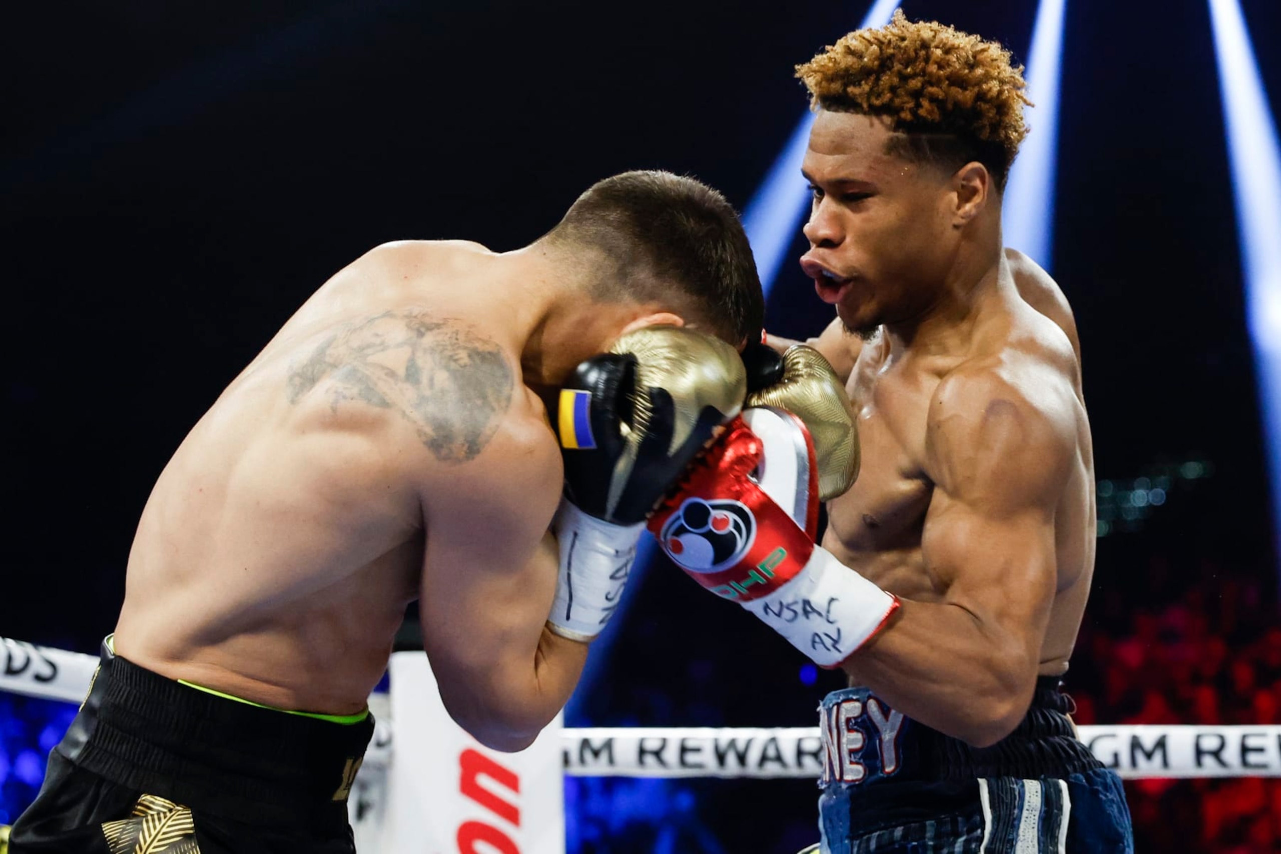 LAS VEGAS, NEVADA - MAY 20: Devin Haney exchanges punches with  Vasyl Lomachenko of Ukraine during their undisputed lightweight title bout at MGM Grand Garden Arena on May 20, 2023 in Las Vegas, Nevada. (Photo by Sarah Stier/Getty Images)