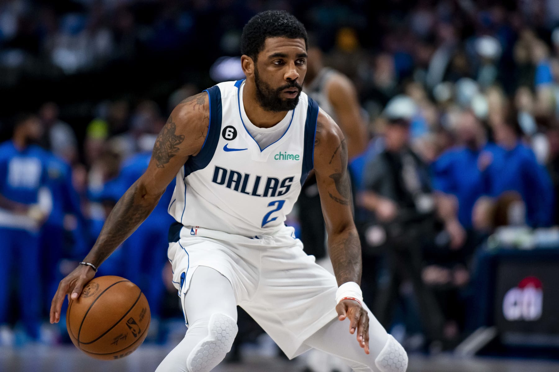 Dallas Mavericks guard Kyrie Irving (2) practices dribbling the ball prior to the start of an NBA basketball game against the San Antonio Spurs on Thursday, Feb. 23, 2023, in Dallas. (AP Photo/Emil T. Lippe)