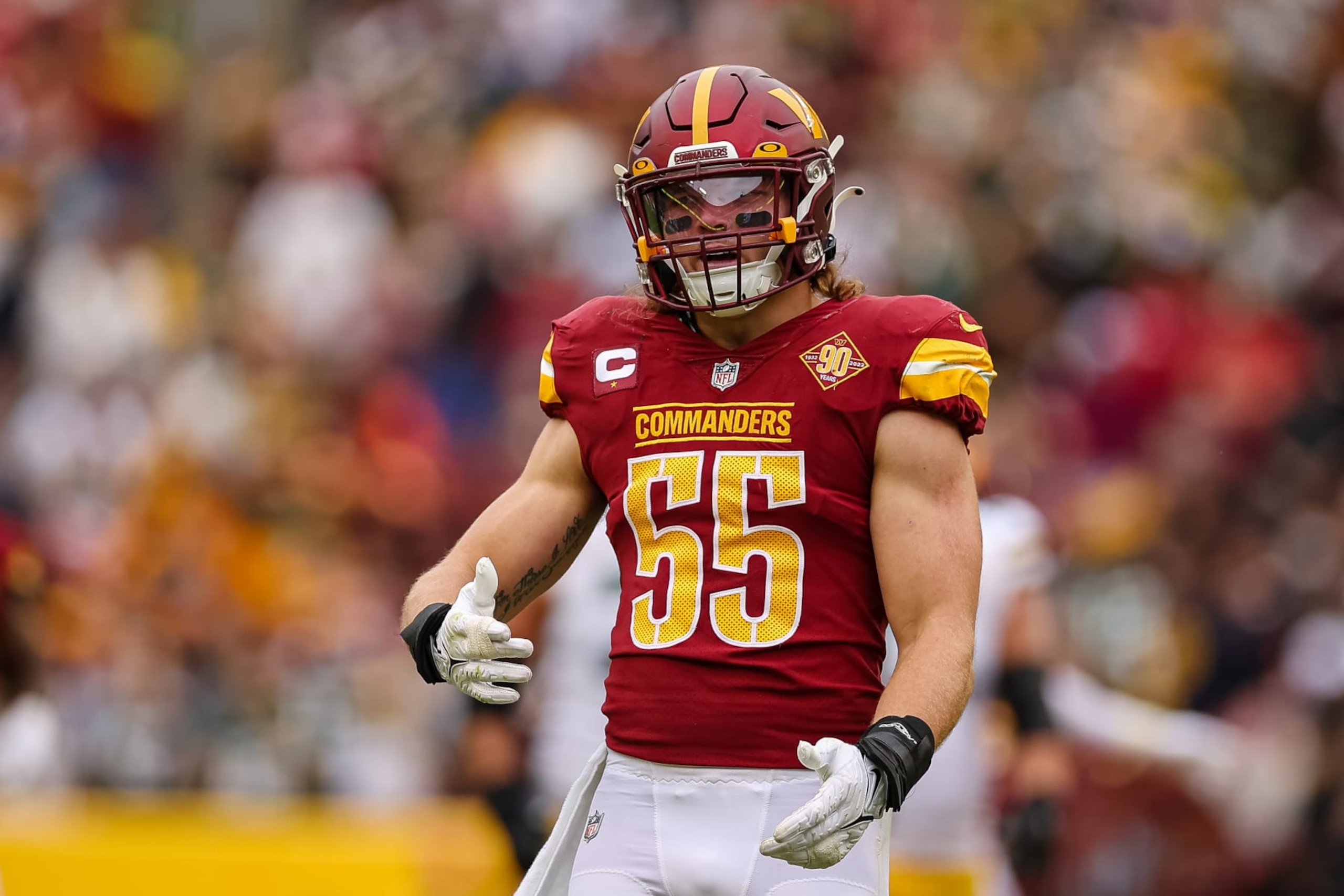 LANDOVER, MD - OCTOBER 23: Cole Holcomb #55 of the Washington Commanders reacts to a play against the Green Bay Packers during the first half of the game at FedExField on October 23, 2022 in Landover, Maryland. (Photo by Scott Taetsch/Getty Images)