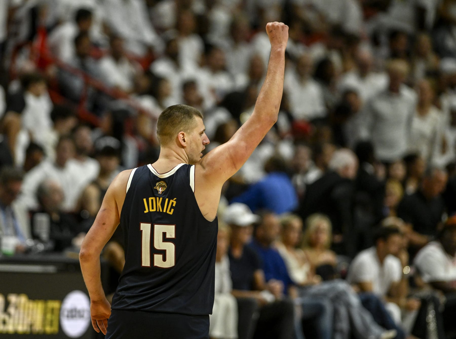 MIAMI, FL - JUNE 9: Nikola Jokic (15) of the Denver Nuggets raises a celebratory fist after a big make by Bruce Brown (11) against the Miami Heat in the fourth quarter of the Nuggets' 108-95 win during Game 4 of the NBA Finals at the Kaseya Center in Miami on Friday, June 9, 2023. (Photo by AAron Ontiveroz/The Denver Post)