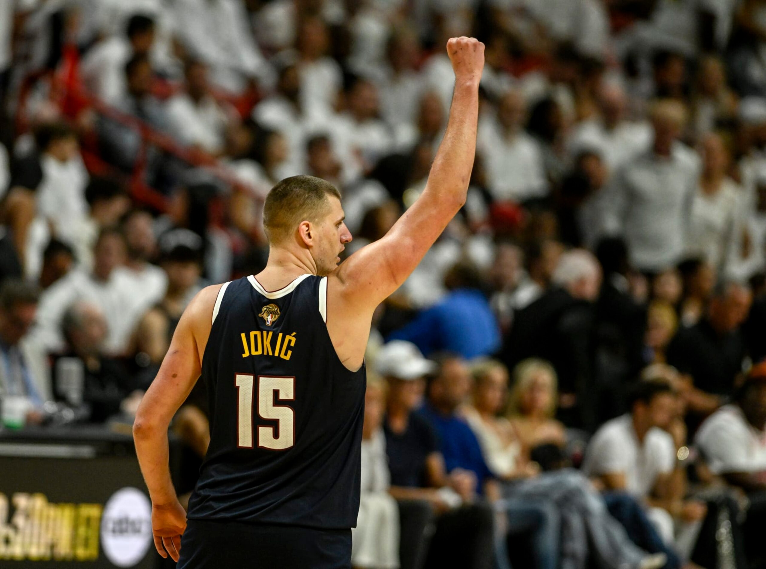 MIAMI, FL - JUNE 9: Nikola Jokic (15) of the Denver Nuggets raises a celebratory fist after a big make by Bruce Brown (11) against the Miami Heat in the fourth quarter of the Nuggets' 108-95 win during Game 4 of the NBA Finals at the Kaseya Center in Miami on Friday, June 9, 2023. (Photo by AAron Ontiveroz/The Denver Post) MIAMI, FL - JUNE 9: Nikola Jokic (15) of the Denver Nuggets raises a celebratory fist after a big make by Bruce Brown (11) against the Miami Heat in the fourth quarter of the Nuggets' 108-95 win during Game 4 of the NBA Finals at the Kaseya Center in Miami on Friday, June 9, 2023. (Photo by AAron Ontiveroz/The Denver Post)