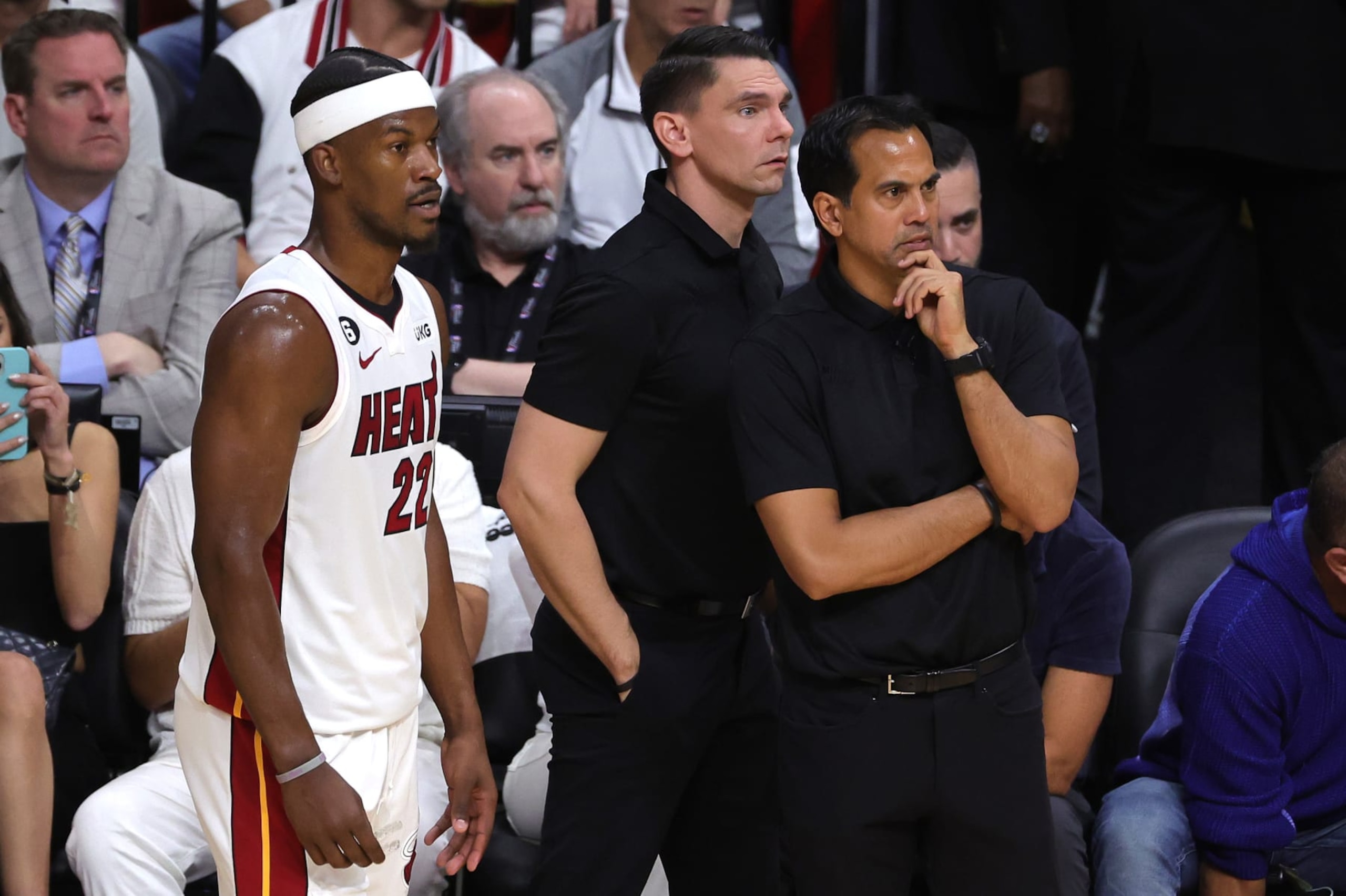 MIAMI, FLORIDA - JUNE 09: Head coach Erik Spoelstra of the Miami Heat and Jimmy Butler #22 look on during the second quarter against the Denver Nuggets in Game Four of the 2023 NBA Finals at Kaseya Center on June 09, 2023 in Miami, Florida. NOTE TO USER: User expressly acknowledges and agrees that, by downloading and or using this photograph, User is consenting to the terms and conditions of the Getty Images License Agreement. (Photo by Megan Briggs/Getty Images)