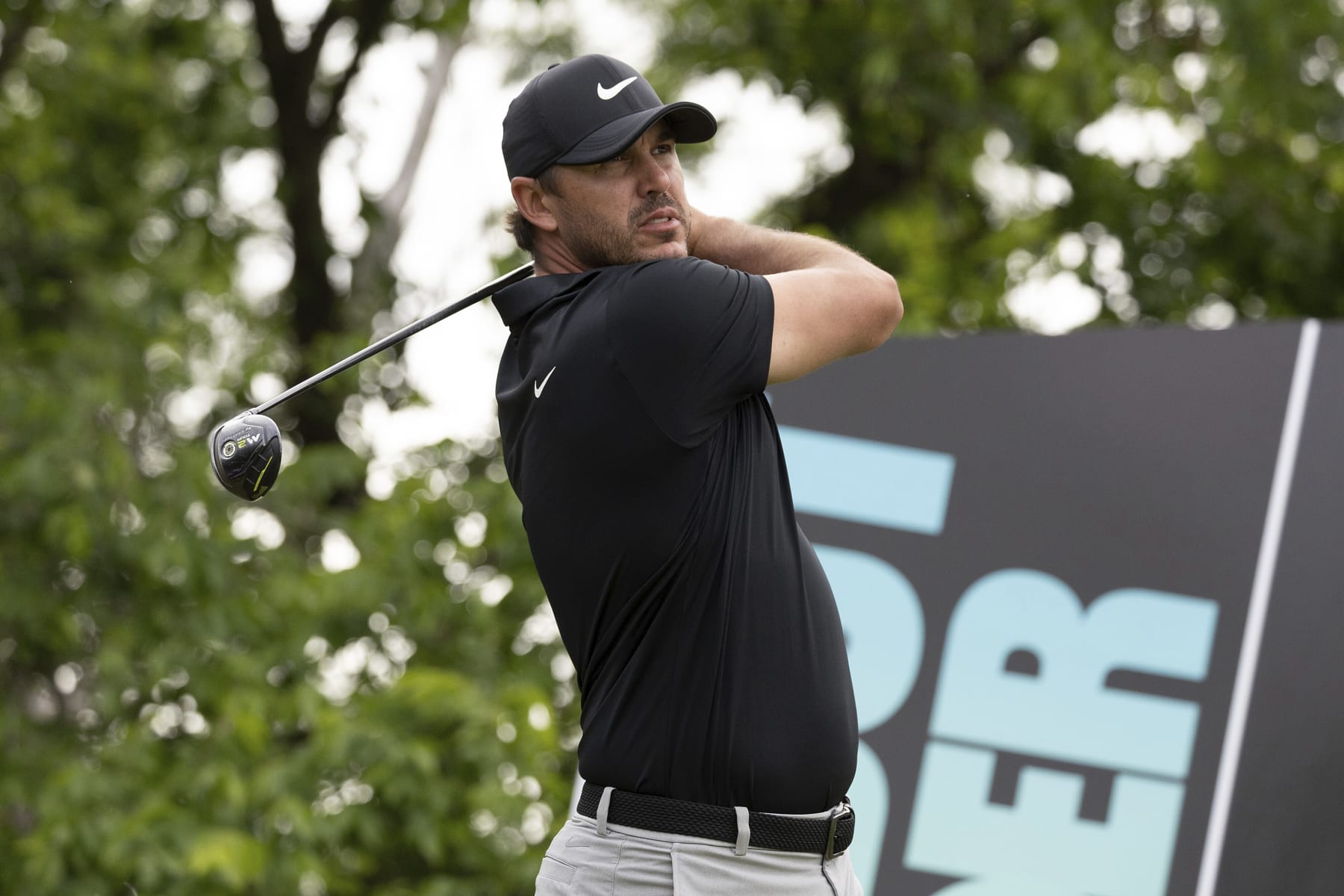 Captain Brooks Koepka of Smash GC hits his shot from the 14th tee during the final round of LIV Golf DC at the Trump National Golf Club Washington DC on Sunday, May 28, 2023 in Sterling, Virginia. (Photo by Hunter Martin/LIV Golf via AP)