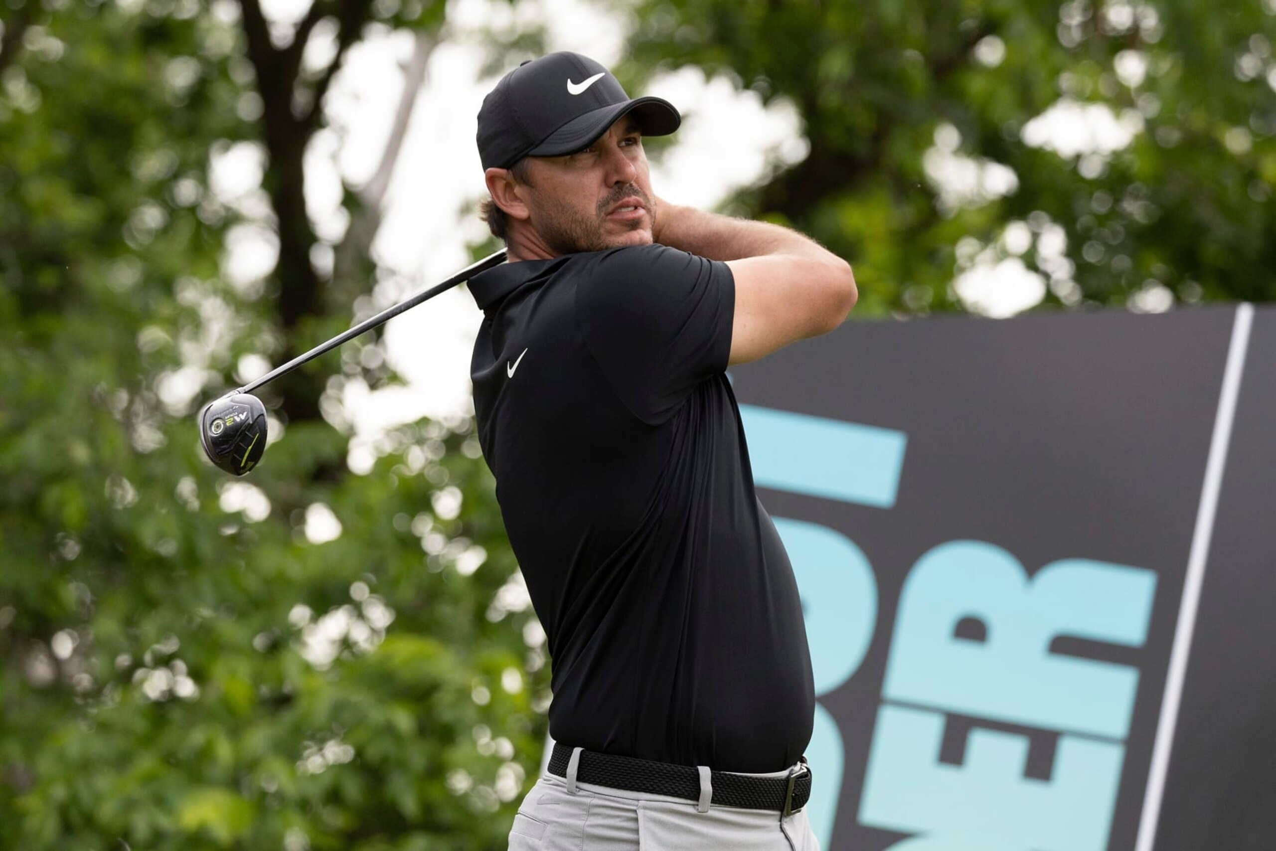 Captain Brooks Koepka of Smash GC hits his shot from the 14th tee during the final round of LIV Golf DC at the Trump National Golf Club Washington DC on Sunday, May 28, 2023 in Sterling, Virginia. (Photo by Hunter Martin/LIV Golf via AP)