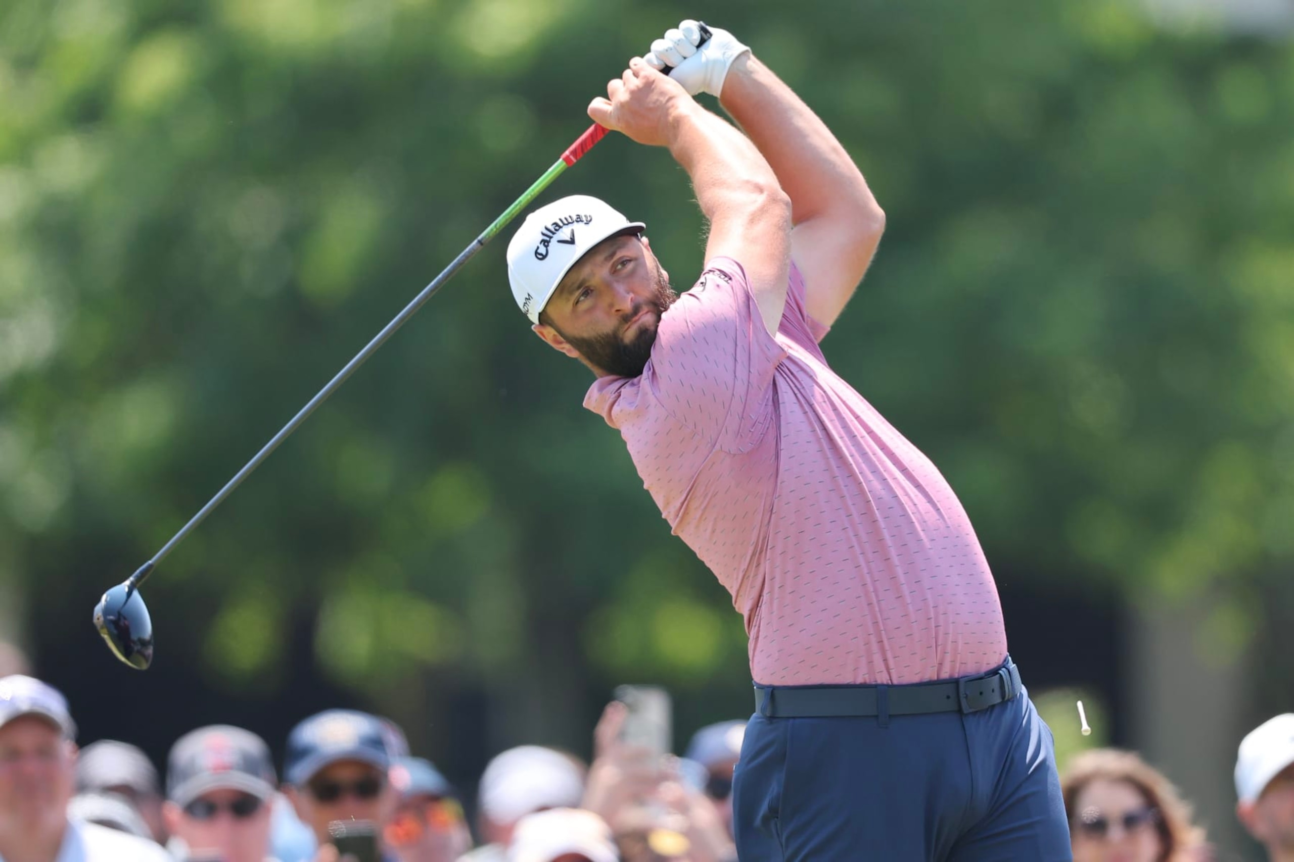 DUBLIN, OHIO - JUNE 04: Jon Rahm of Spain hits a tee shot on the tenth hole during the final round of the Memorial Tournament presented by Workday at Muirfield Village Golf Club on June 04, 2023 in Dublin, Ohio. (Photo by Michael Reaves/Getty Images)