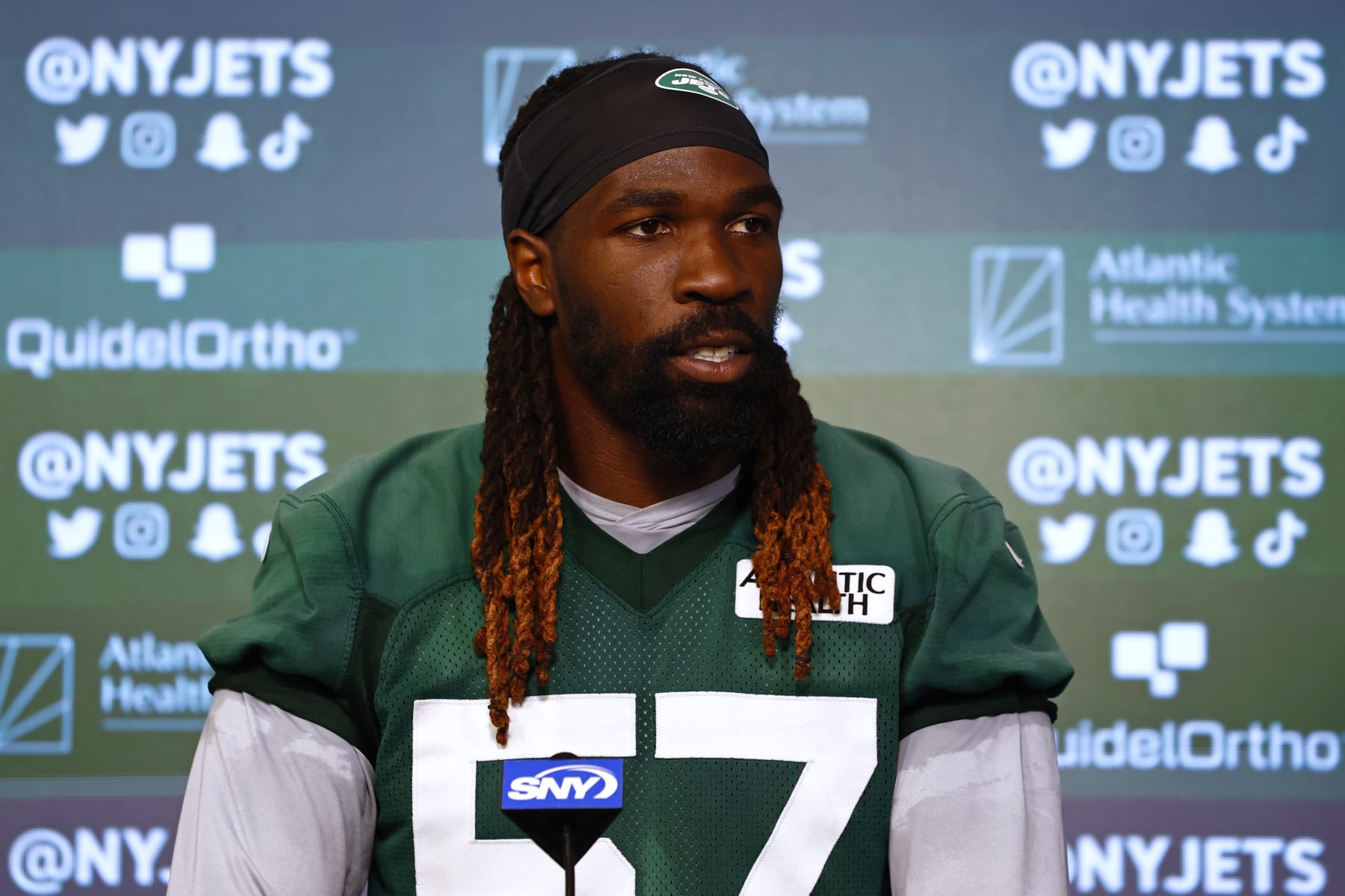 FLORHAM PARK, NEW JERSEY - JUNE 6: Linebacker C.J. Mosley #57 of the New York Jets talks to reporters after the teams OTAs at Atlantic Health Jets Training Center on June 6, 2023 in Florham Park, New Jersey. (Photo by Rich Schultz/Getty Images)