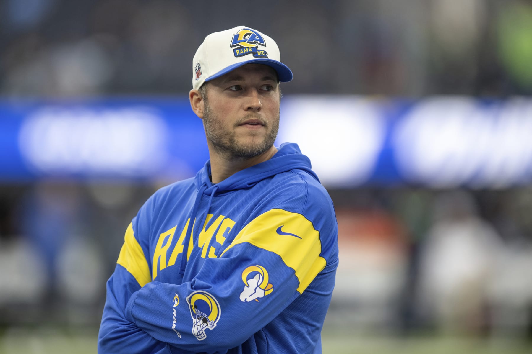 Los Angeles Rams quarterback Matthew Stafford (9) looks on before an NFL football game against the Seattle Seahawks, Sunday, Dec. 4, 2022, in Inglewood, Calif. (AP Photo/Kyusung Gong)
