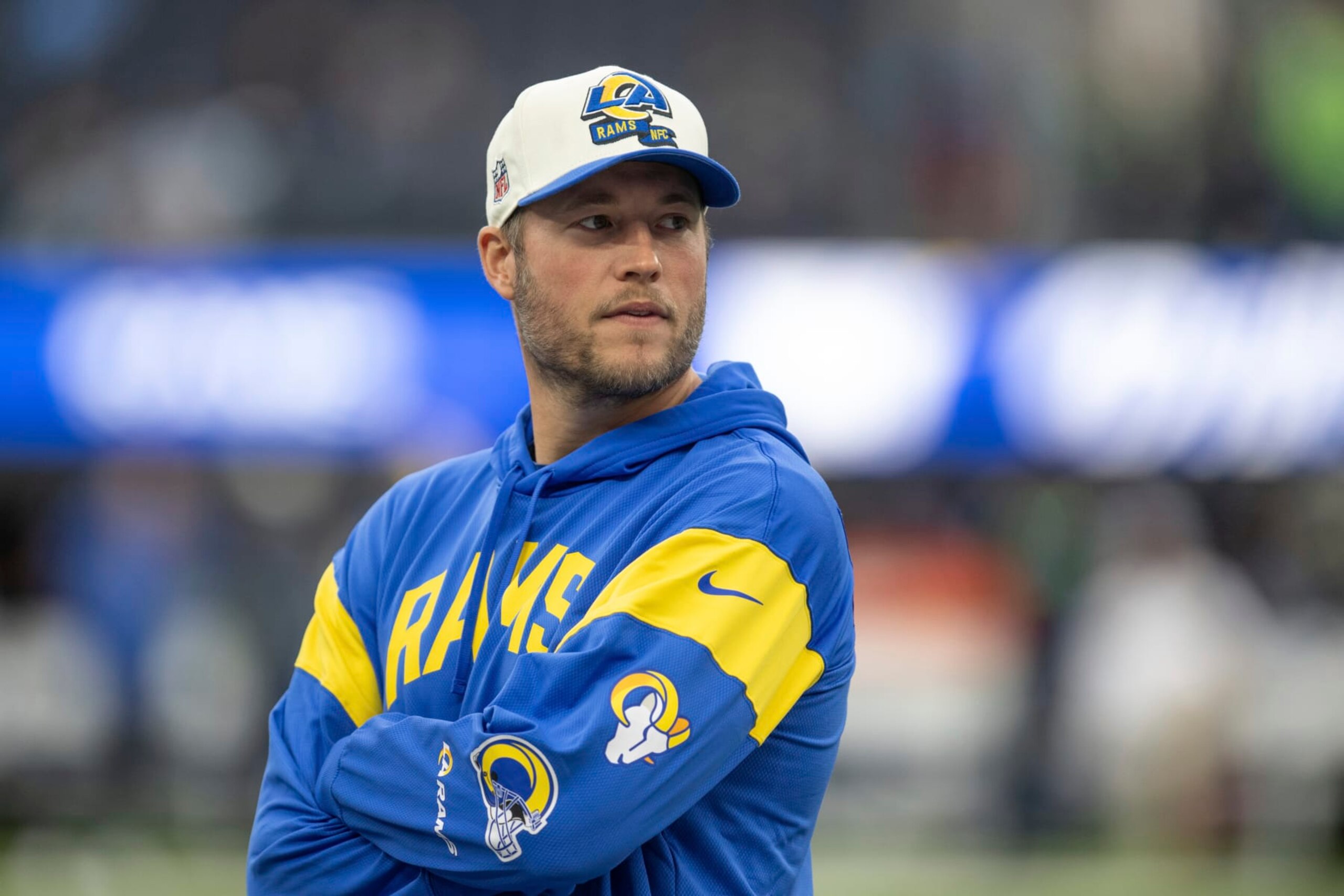 Los Angeles Rams quarterback Matthew Stafford (9) looks on before an NFL football game against the Seattle Seahawks, Sunday, Dec. 4, 2022, in Inglewood, Calif. (AP Photo/Kyusung Gong)