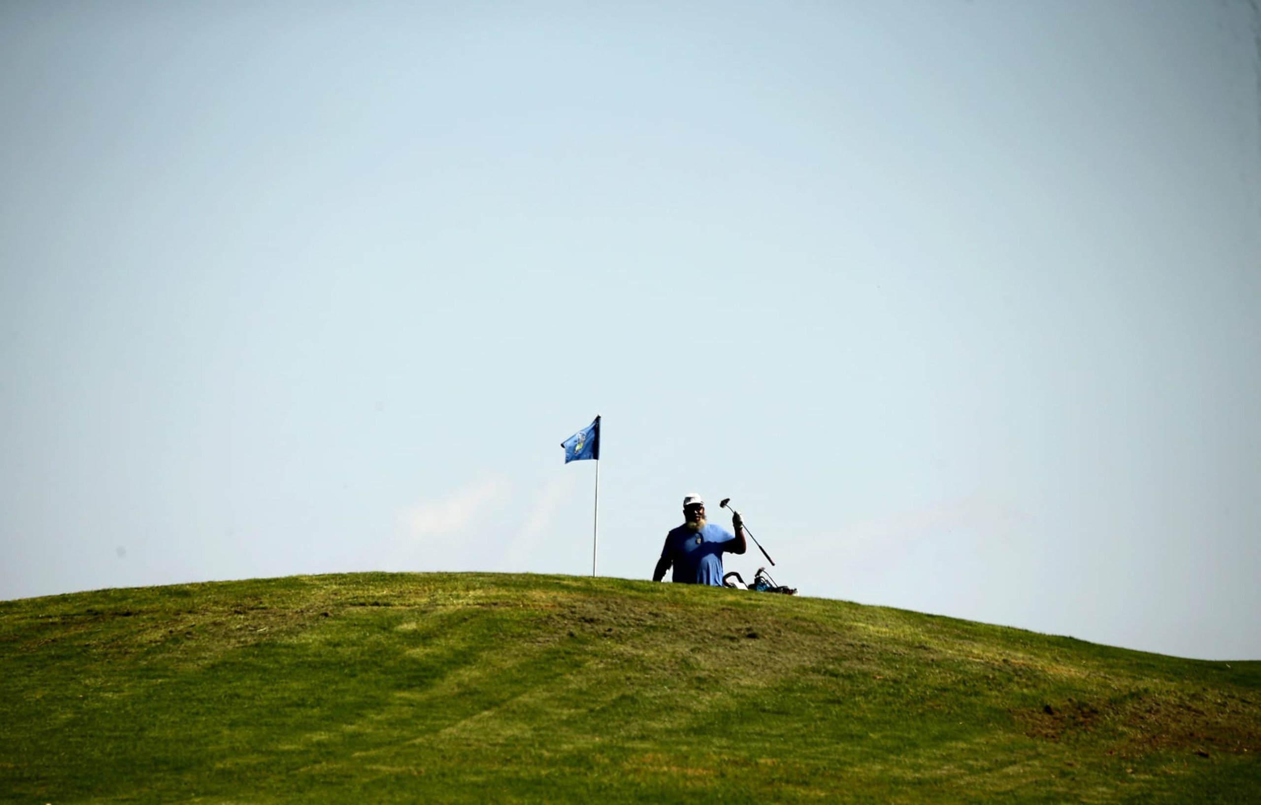 Los angeles, Calif. - June 2, 2023. As part of hosting the US Open, Los Angeles Country Club is donating more than $1 million to redesign and renovate the nine-hole, par-3 Maggie Hathaway Golf Course in South Los Angeles. The goal is to enhance civic pride and promote golf among the underserved. Above, a golfrer plays a hole at Hathaway. (Luis Sinco / Los Angeles Times via Getty Images) Los angeles, Calif. - June 2, 2023. As part of hosting the US Open, Los Angeles Country Club is donating more than $1 million to redesign and renovate the nine-hole, par-3 Maggie Hathaway Golf Course in South Los Angeles. The goal is to enhance civic pride and promote golf among the underserved. Above, a golfrer plays a hole at Hathaway. (Luis Sinco / Los Angeles Times via Getty Images)