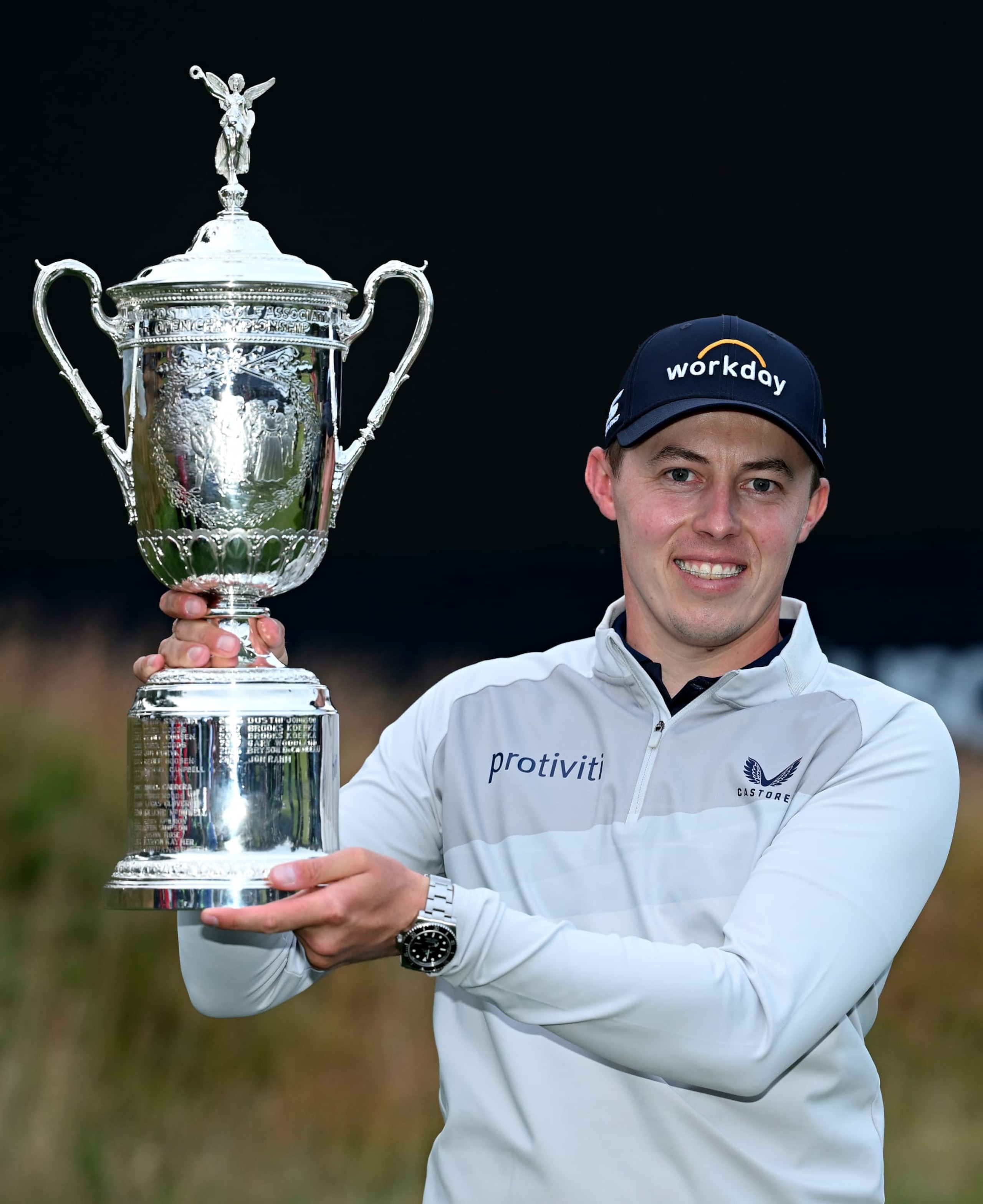 BROOKLINE, MASSACHUSETTS - JUNE 19: Matthew Fitzpatrick of England celebrates with the winners trophy after the final round of the 122nd U.S. Open Championship at The Country Club on June 19, 2022 in Brookline, Massachusetts. (Photo by Ross Kinnaird/Getty Images)