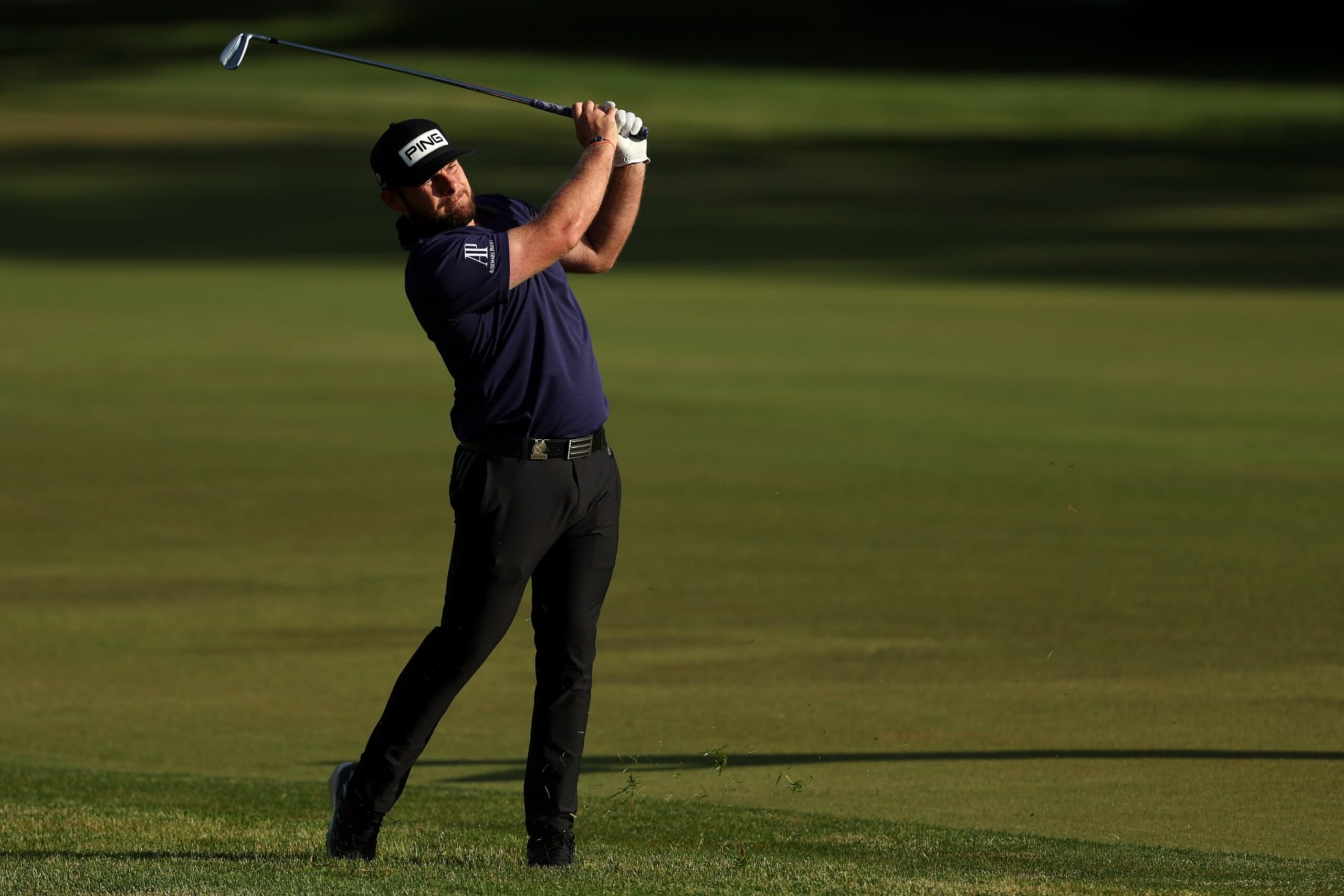 BROOKLINE, MASSACHUSETTS - JUNE 17: Tyrrell Hatton of England plays an approach shot on the first hole during the second round of the 122nd U.S. Open Championship at The Country Club on June 17, 2022 in Brookline, Massachusetts. (Photo by Patrick Smith/Getty Images)