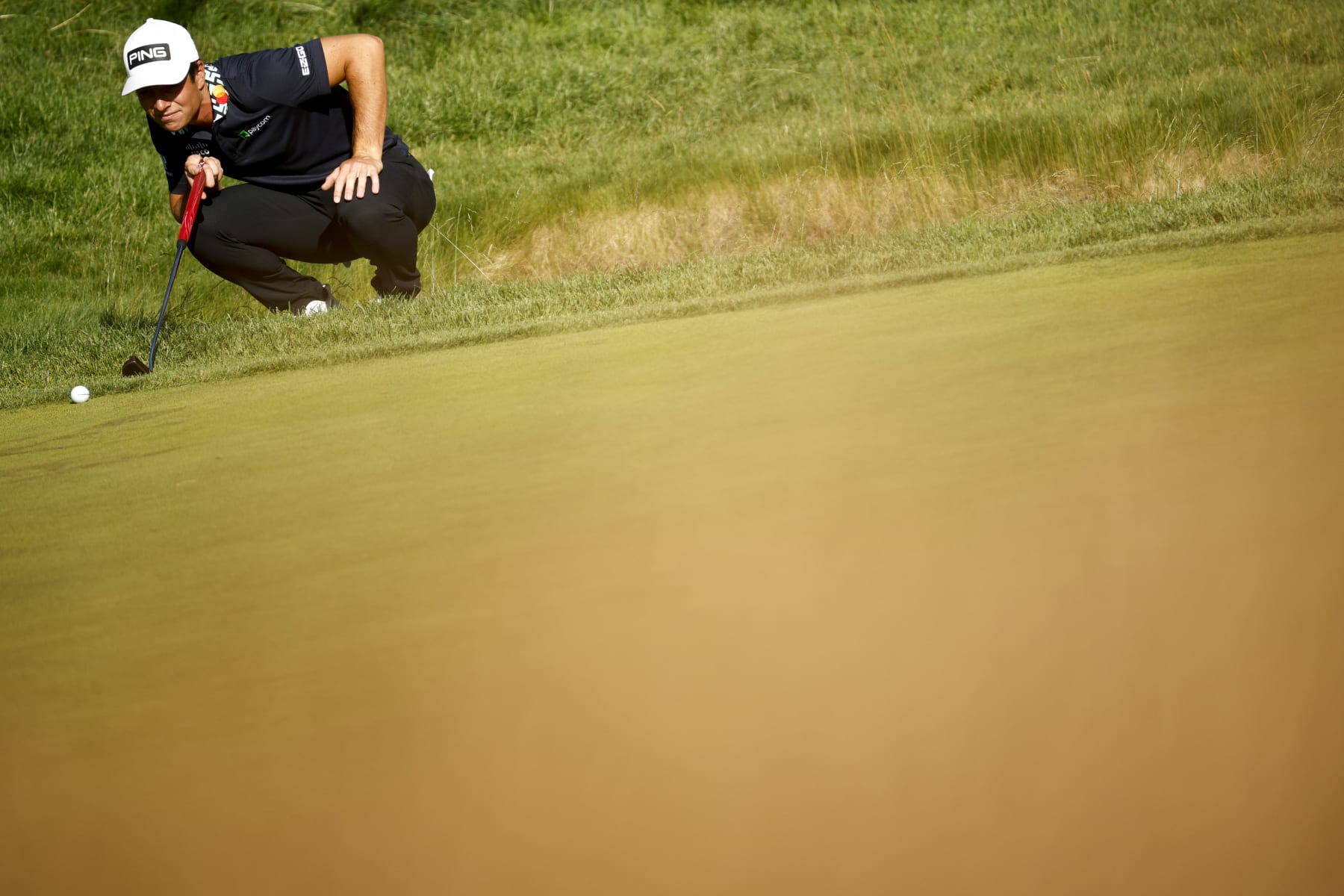 BROOKLINE, MASSACHUSETTS - JUNE 17: Viktor Hovland of Norway lines up a putt on the tenth green during the second round of the 122nd U.S. Open Championship at The Country Club on June 17, 2022 in Brookline, Massachusetts. (Photo by Jared C. Tilton/Getty Images)