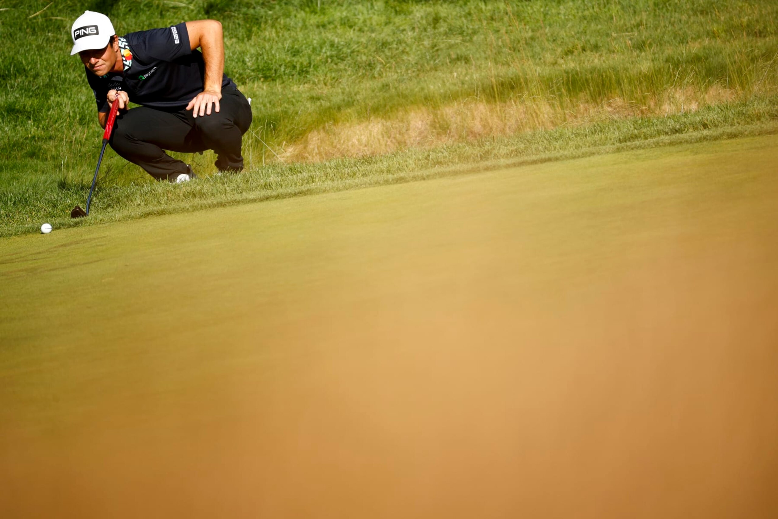 BROOKLINE, MASSACHUSETTS - JUNE 17: Viktor Hovland of Norway lines up a putt on the tenth green during the second round of the 122nd U.S. Open Championship at The Country Club on June 17, 2022 in Brookline, Massachusetts. (Photo by Jared C. Tilton/Getty Images)