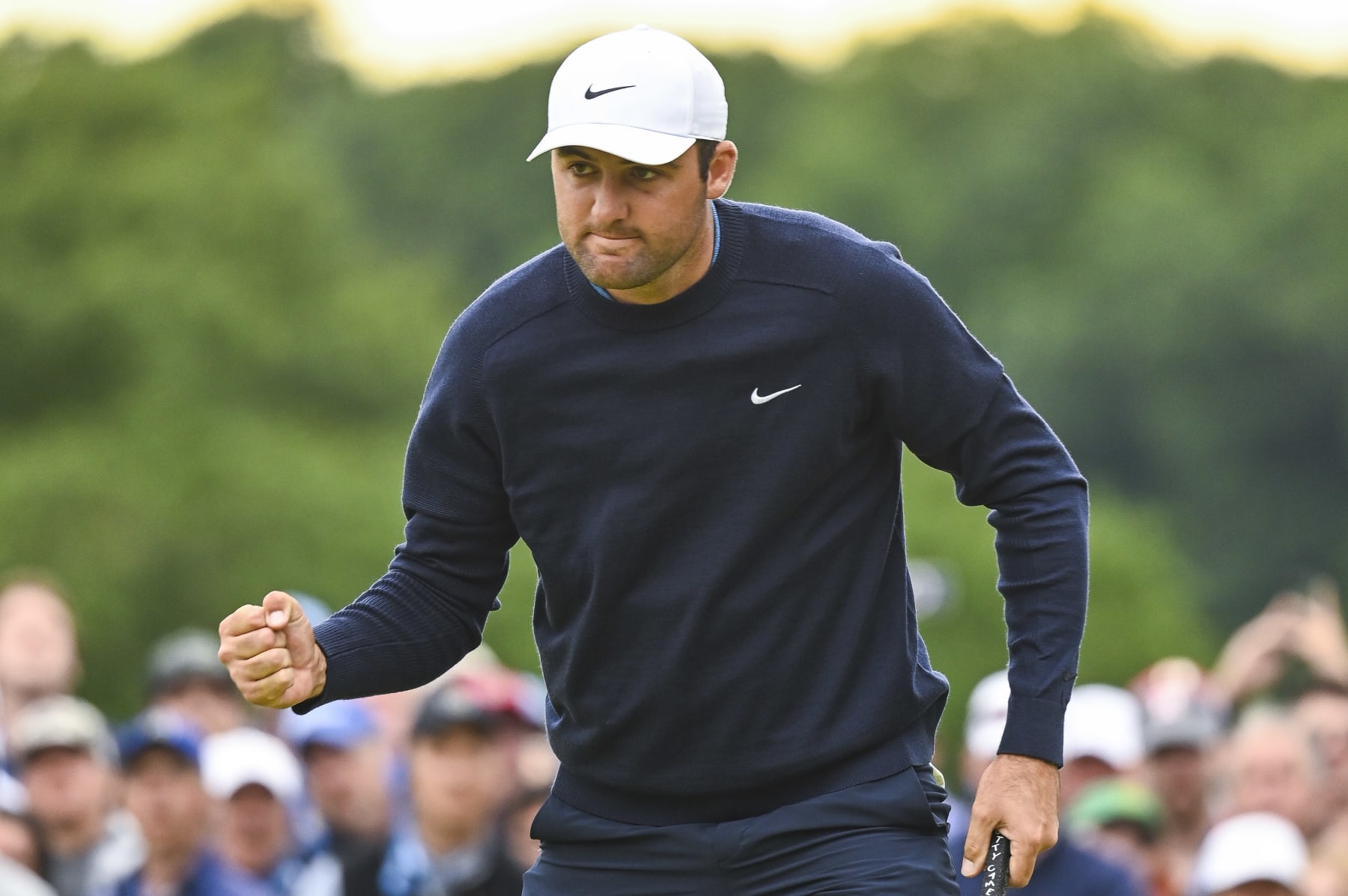 BROOKLINE, MA - JUNE 19:  Scottie Scheffler celebrates with a fist pump after making a birdie putt on the eighth hole green during the final round of the U.S. Open at The Country Club on June 19, 2022 in Brookline, Massachusetts. (Photo by Keyur Khamar/PGA TOUR via Getty Images)