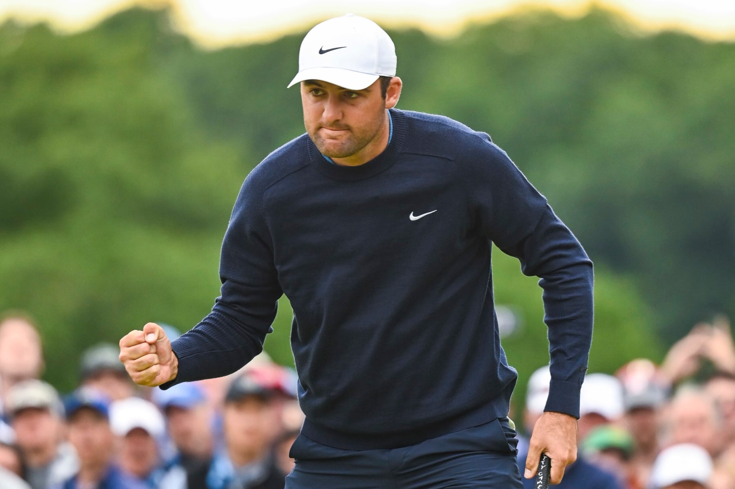 BROOKLINE, MA - JUNE 19:  Scottie Scheffler celebrates with a fist pump after making a birdie putt on the eighth hole green during the final round of the U.S. Open at The Country Club on June 19, 2022 in Brookline, Massachusetts. (Photo by Keyur Khamar/PGA TOUR via Getty Images)