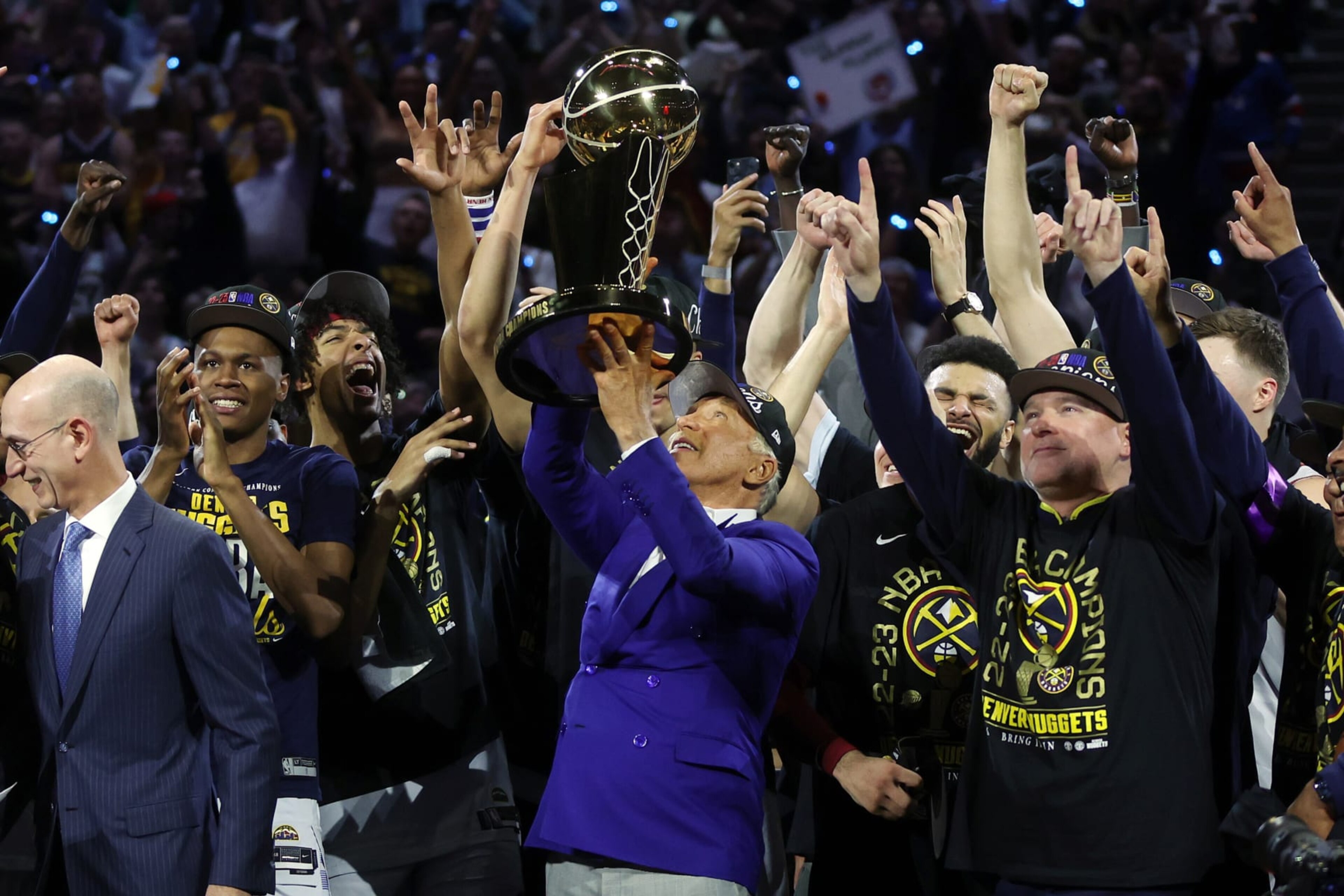 DENVER, COLORADO - JUNE 12: Denver Nuggets owner Stan Kroenke raises the Larry O'Brien Championship Trophy after a 94-89 victory against the Miami Heat in Game Five of the 2023 NBA Finals to win the NBA Championship at Ball Arena on June 12, 2023 in Denver, Colorado. NOTE TO USER: User expressly acknowledges and agrees that, by downloading and or using this photograph, User is consenting to the terms and conditions of the Getty Images License Agreement. (Photo by Matthew Stockman/Getty Images)