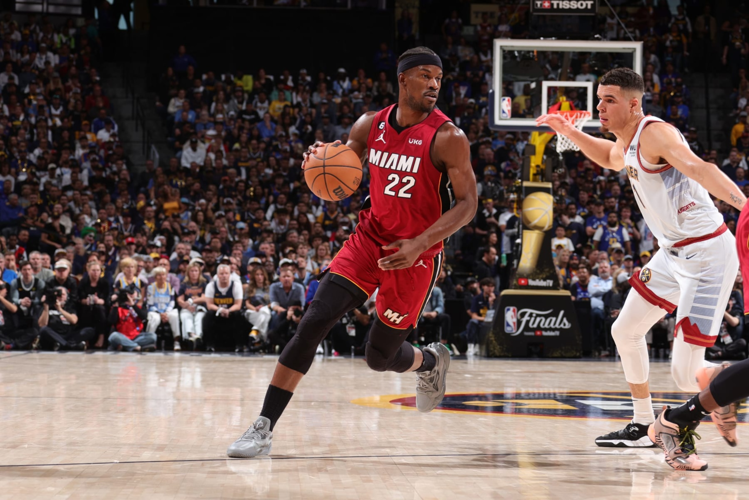 DENVER, CO - JUNE 12: Jimmy Butler #22 of the Miami Heat dribbles the ball during the game against the Denver Nuggets during Game Five of the 2023 NBA Finals on June 12, 2023 at Ball Arena in Denver, Colorado. NOTE TO USER: User expressly acknowledges and agrees that, by downloading and or using this Photograph, user is consenting to the terms and conditions of the Getty Images License Agreement. Mandatory Copyright Notice: Copyright 2023 NBAE (Photo by Nathaniel S. Butler/NBAE via Getty Images)