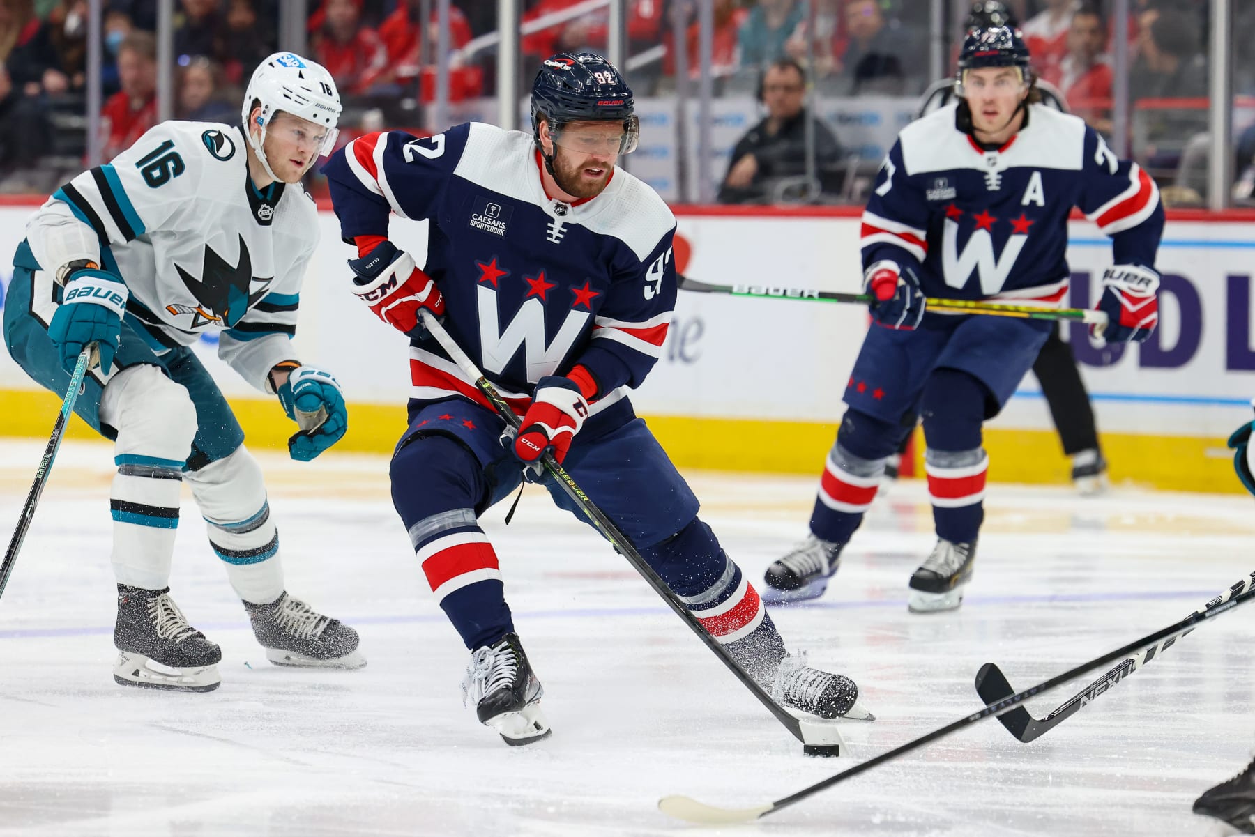WASHINGTON, DC - FEBRUARY 12: Evgeny Kuznetsov #92 of the Washington Capitals controls the puck during a game against the San Jose Sharks at Capital One Arena on February 12, 2023 in Washington, D.C. (Photo by John McCreary/NHLI via Getty Images)