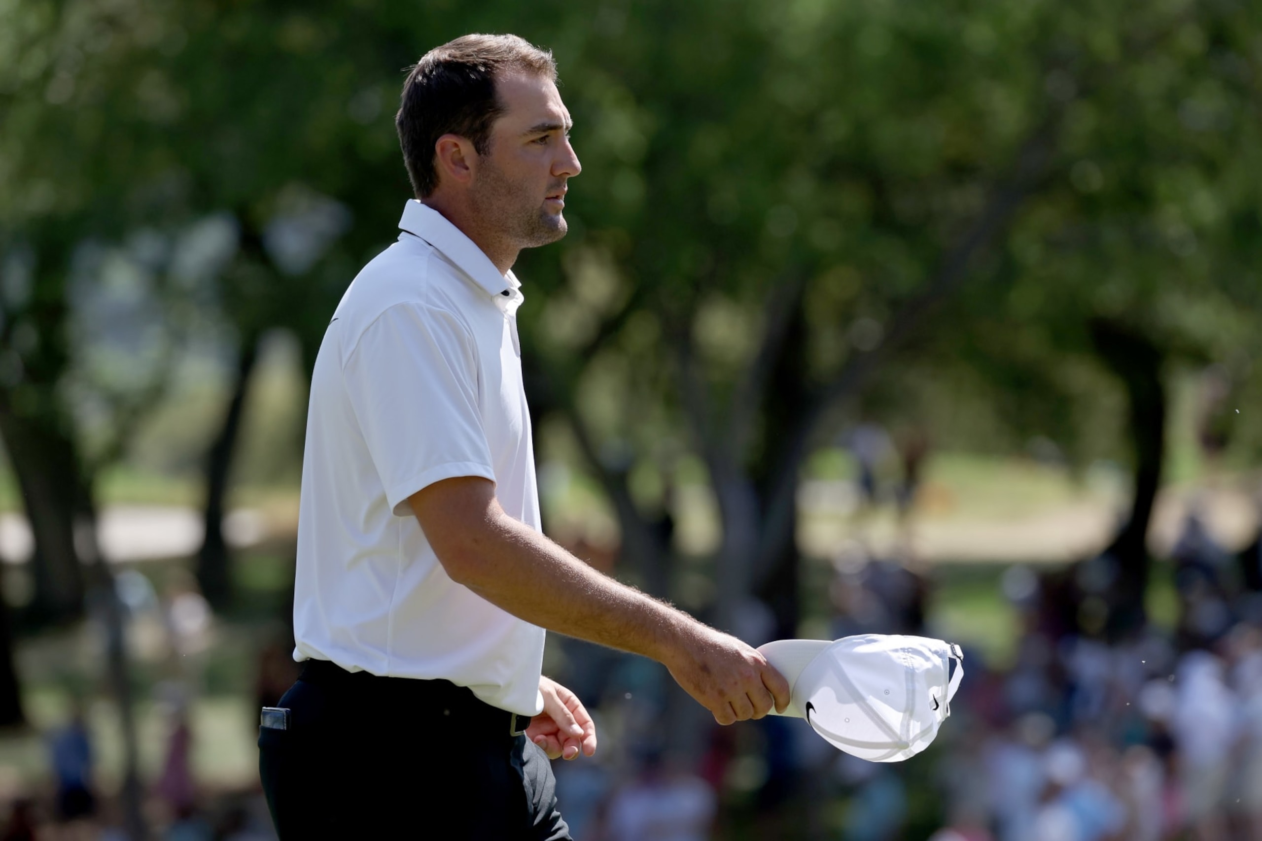 AUSTIN, TEXAS - MARCH 25: Scottie Scheffler of the United States reacts on the 18th green after defeating J.T. Poston of the United States 1 up during day four of the World Golf Championships-Dell Technologies Match Play at Austin Country Club on March 25, 2023 in Austin, Texas. (Photo by Harry How/Getty Images) AUSTIN, TEXAS - MARCH 25: Scottie Scheffler of the United States reacts on the 18th green after defeating J.T. Poston of the United States 1 up during day four of the World Golf Championships-Dell Technologies Match Play at Austin Country Club on March 25, 2023 in Austin, Texas. (Photo by Harry How/Getty Images)