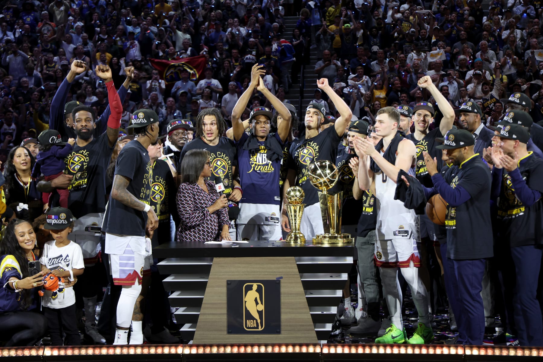 DENVER, CO - JUNE 12:  The Denver Nuggets are presented with the Larry O'Brien Championship Trophy after Game Five of the 2023 NBA Finals on June 12, 2023 at Ball Arena in Denver, Colorado. NOTE TO USER: User expressly acknowledges and agrees that, by downloading and or using this Photograph, user is consenting to the terms and conditions of the Getty Images License Agreement. Mandatory Copyright Notice: Copyright 2023 NBAE (Photo by Joe Murphy/NBAE via Getty Images)