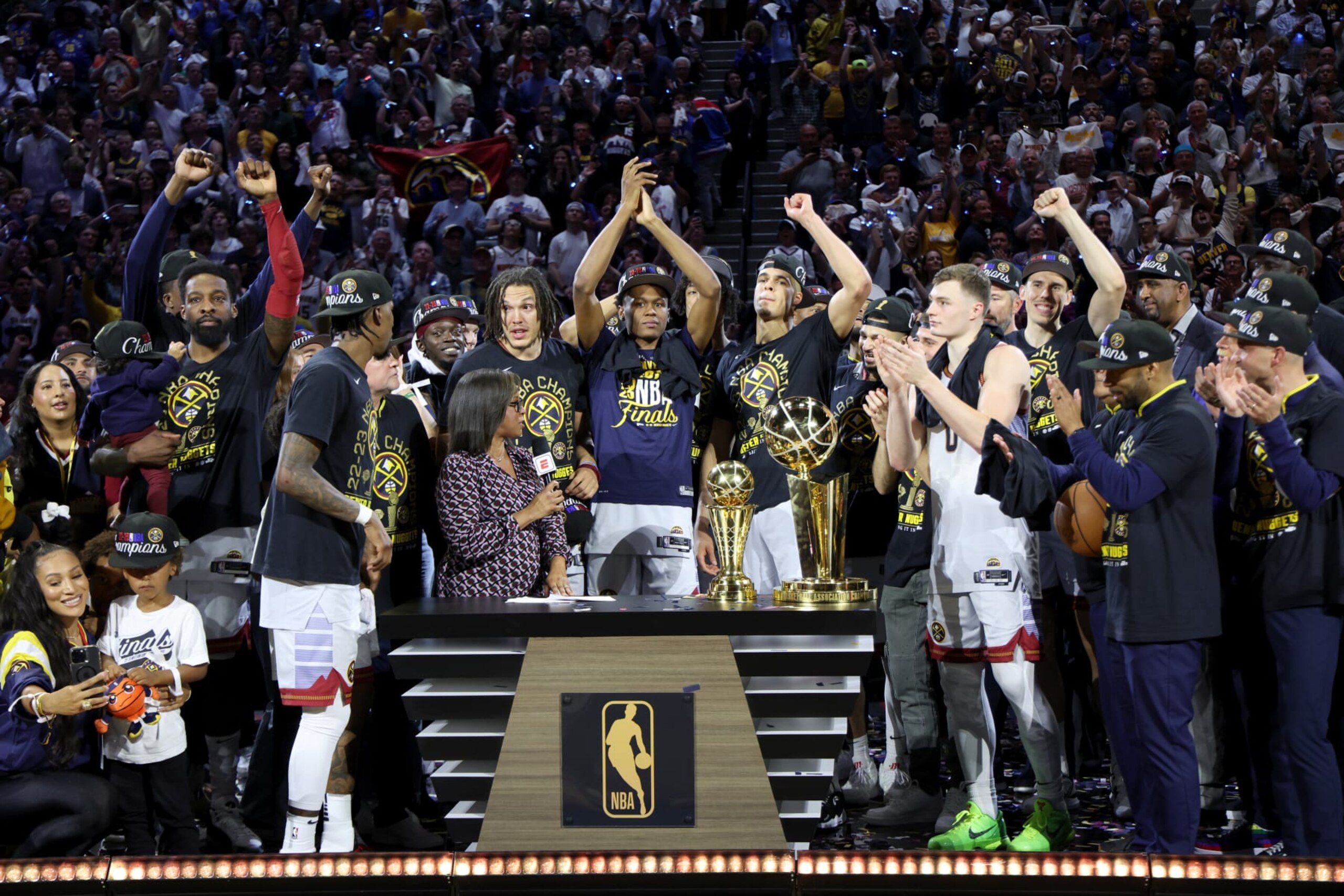DENVER, CO - JUNE 12: The Denver Nuggets are presented with the Larry O'Brien Championship Trophy after Game Five of the 2023 NBA Finals on June 12, 2023 at Ball Arena in Denver, Colorado. NOTE TO USER: User expressly acknowledges and agrees that, by downloading and or using this Photograph, user is consenting to the terms and conditions of the Getty Images License Agreement. Mandatory Copyright Notice: Copyright 2023 NBAE (Photo by Joe Murphy/NBAE via Getty Images) DENVER, CO - JUNE 12: The Denver Nuggets are presented with the Larry O'Brien Championship Trophy after Game Five of the 2023 NBA Finals on June 12, 2023 at Ball Arena in Denver, Colorado. NOTE TO USER: User expressly acknowledges and agrees that, by downloading and or using this Photograph, user is consenting to the terms and conditions of the Getty Images License Agreement. Mandatory Copyright Notice: Copyright 2023 NBAE (Photo by Joe Murphy/NBAE via Getty Images)