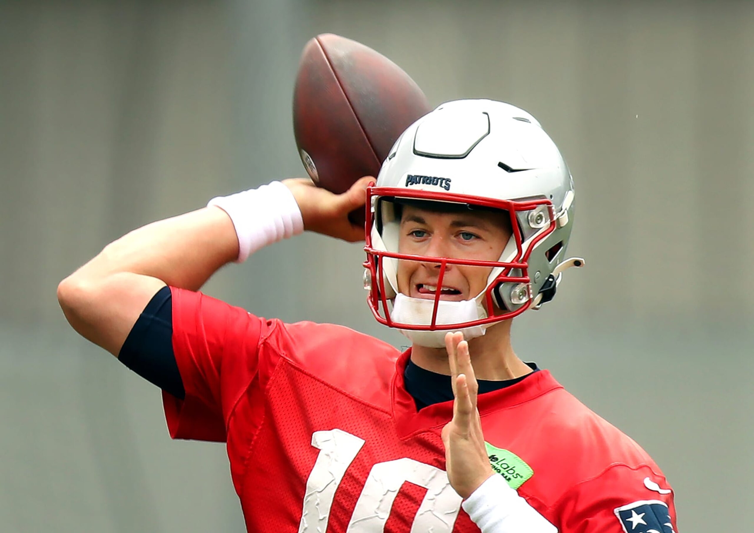 Foxborough, MA - June 9: New England Patriots QB Mac Jones throws a pass during practice. (Photo by John Tlumacki/The Boston Globe via Getty Images)
