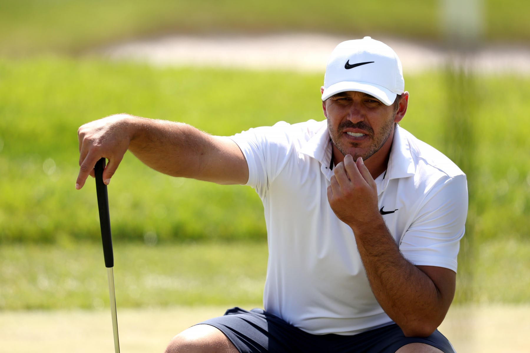 STERLING, VIRGINIA - MAY 26: Brooks Koepka of Smash GC lines up a putt on the ninth green during day one of the LIV Golf Invitational - DC at Trump National Golf Club on May 26, 2023 in Sterling, Virginia. (Photo by Rob Carr/Getty Images)