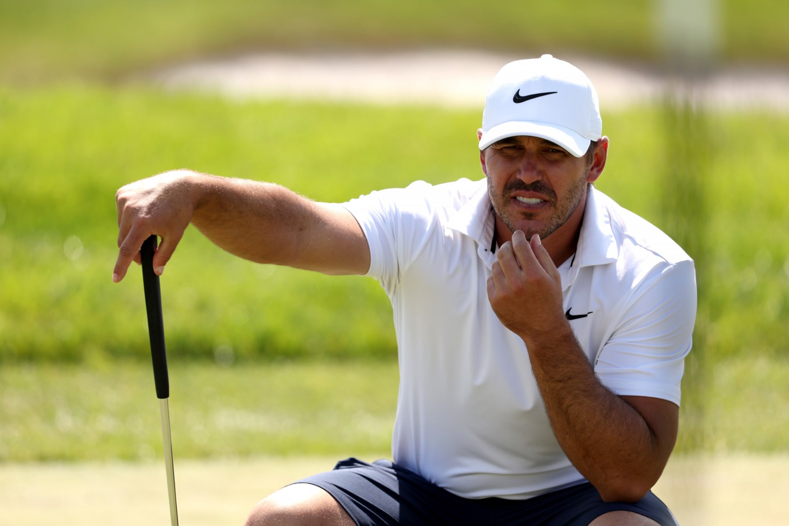 STERLING, VIRGINIA - MAY 26: Brooks Koepka of Smash GC lines up a putt on the ninth green during day one of the LIV Golf Invitational - DC at Trump National Golf Club on May 26, 2023 in Sterling, Virginia. (Photo by Rob Carr/Getty Images)