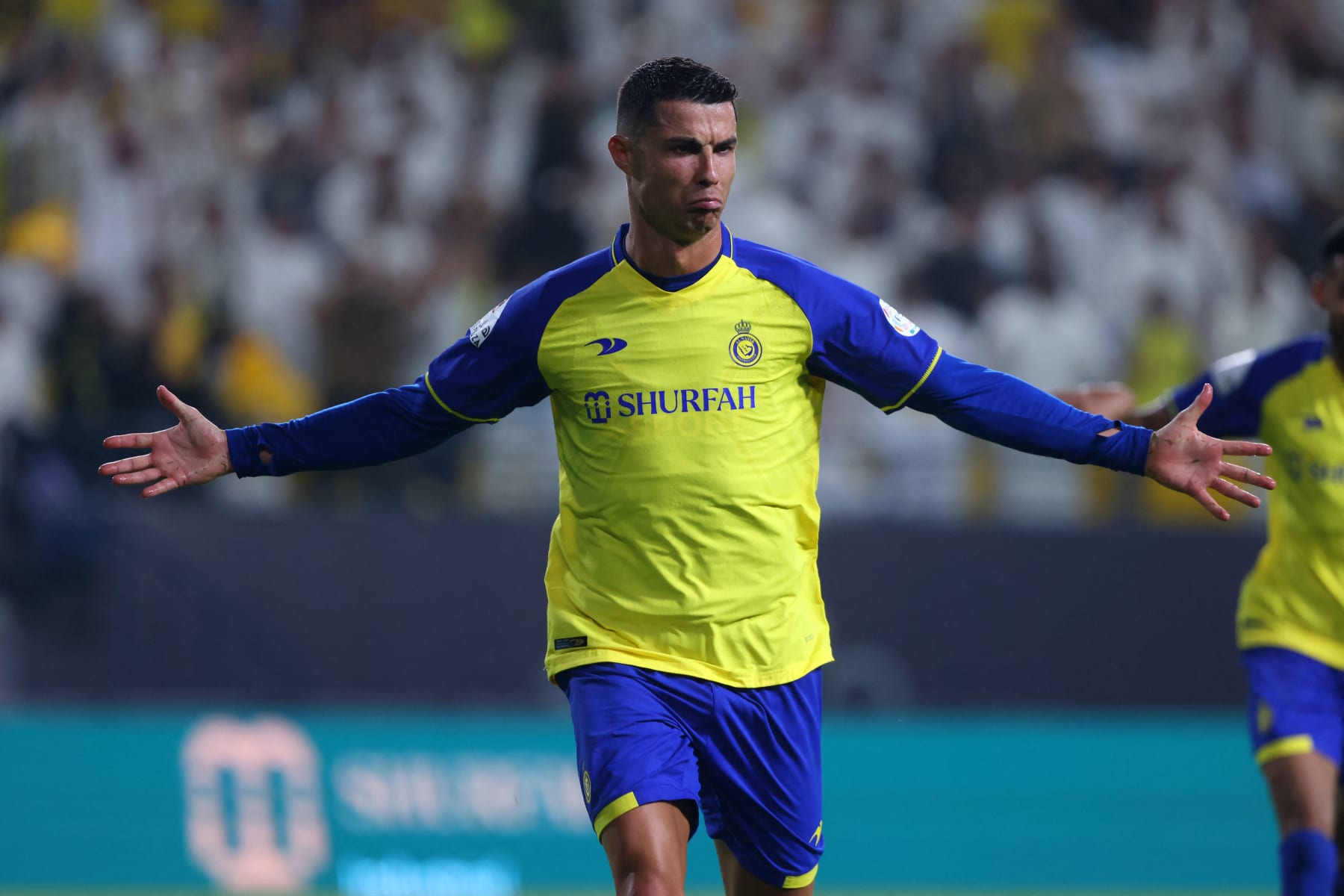 Nassr's Portuguese forward Cristiano Ronaldo reacts after scoring during the Saudi Pro League football match between Al-Nassr and Al-Shabab at the al-Awwal Park Stadium in Riyadh on May 23, 2023. (Photo by Fayez NURELDINE / AFP) (Photo by FAYEZ NURELDINE/AFP via Getty Images)