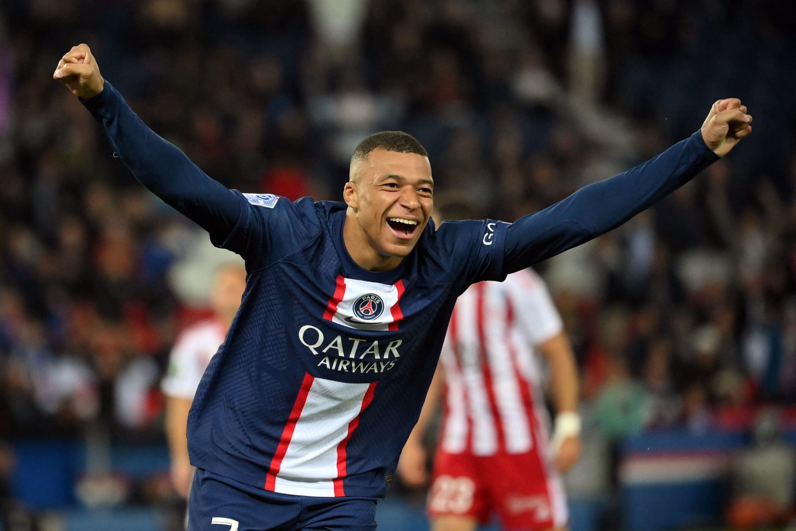 Paris Saint-Germain's French forward Kylian Mbappe celebrates after scoring a goal during the French L1 football match between Paris Saint-Germain (PSG) and Ajaccio at the Parc des Princes in Paris, on May 13, 2023. (Photo by FRANCK FIFE / AFP) (Photo by FRANCK FIFE/AFP via Getty Images)