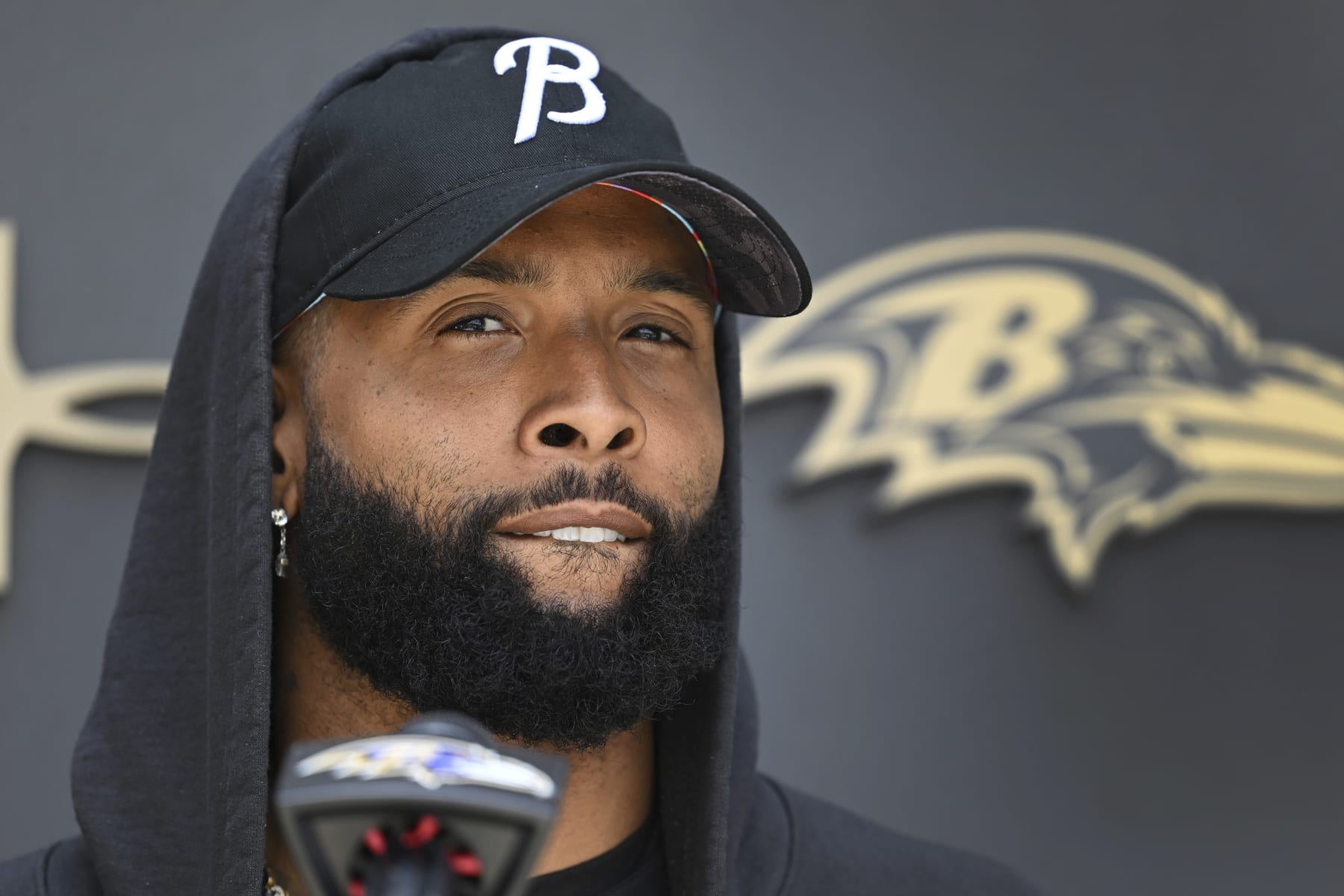 Baltimore Ravens wide receiver Odell Beckham Jr. answers questions from the media before a mandatory NFL football minicamp, Tuesday, June 13, 2019, in Owings Mills, Md. (AP Photo/Gail Burton)