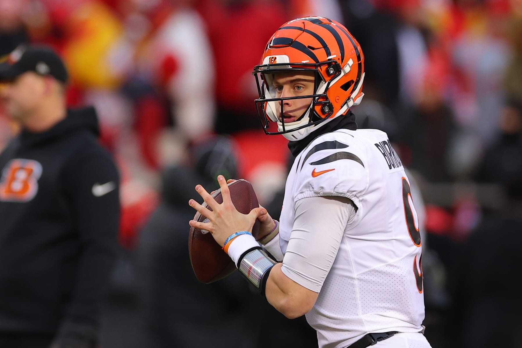 KANSAS CITY, MISSOURI - JANUARY 29: Joe Burrow #9 of the Cincinnati Bengals warms up prior to the AFC Championship Game against the Kansas City Chiefs at GEHA Field at Arrowhead Stadium on January 29, 2023 in Kansas City, Missouri. (Photo by Kevin C. Cox/Getty Images)